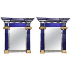 Pair of Blue Paneled Mirrors with Giltwood Details