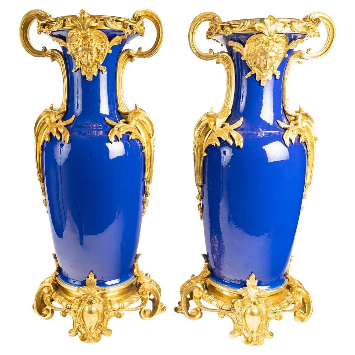 Pair of Blue Porcelain and Gilt Bronze Vases, Regency Style, 20th Century.