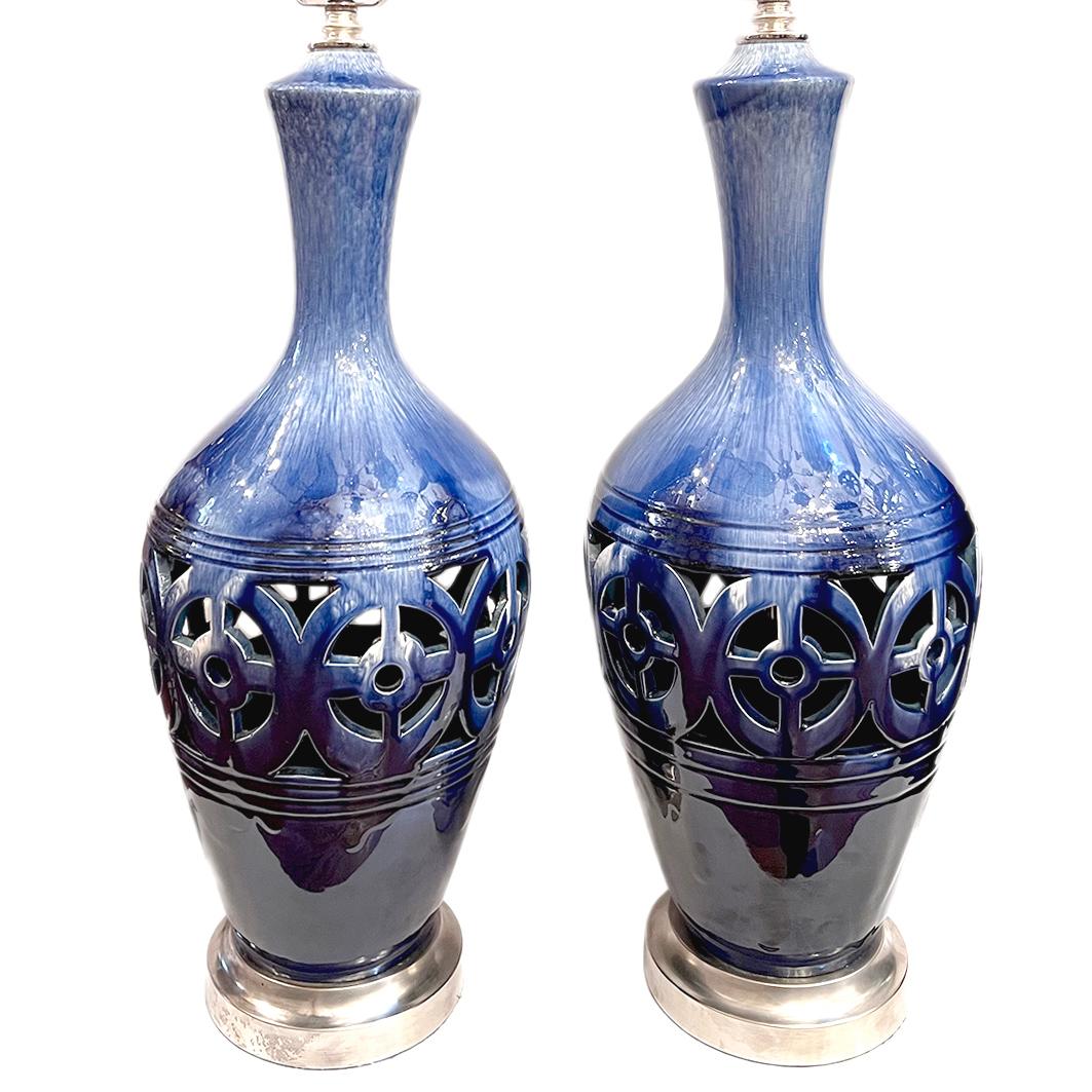 Pair of circa 1950's Italian pierced porcelain lamps. 

Measurements: 
Height of body: 23