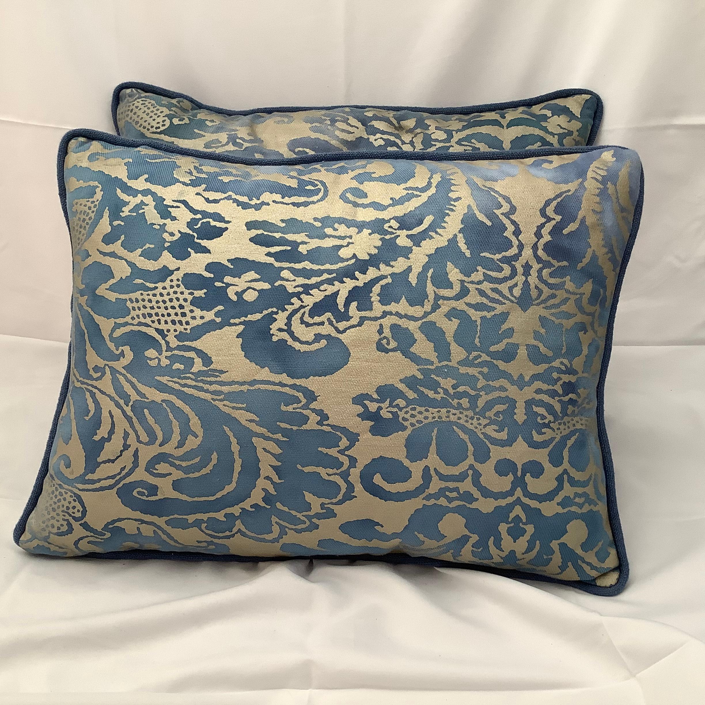 Pair of custom Fortuny textile pillows in dark blue & silver gold fronts and a coordinating dark blue linen back with self cording. Down inserts, sewn closed.