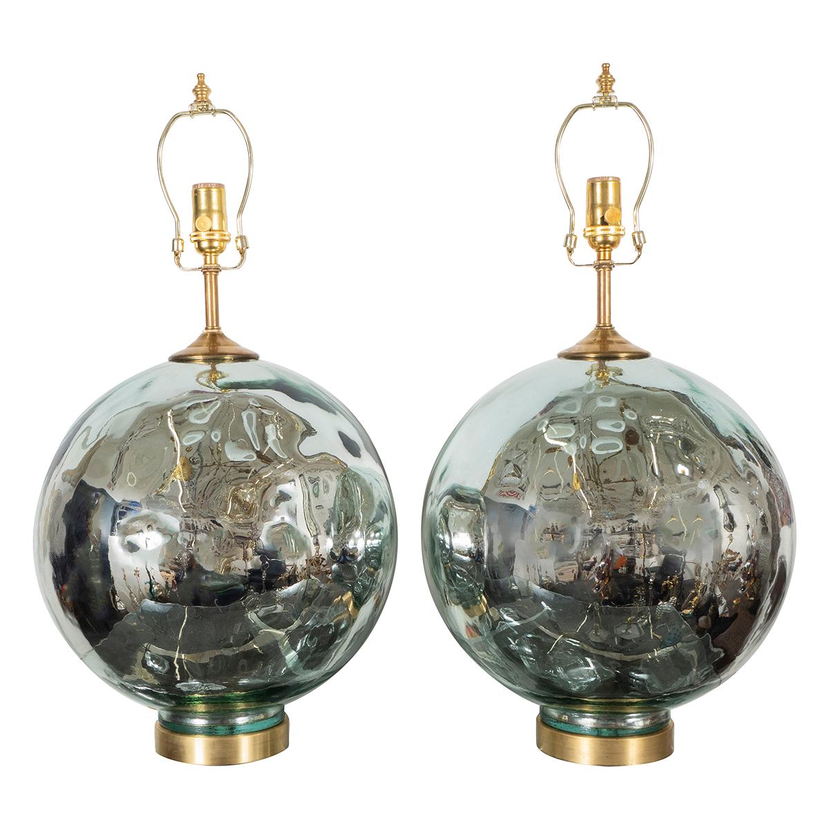 Pair of spherical mercury glass table lamps with blue tint.