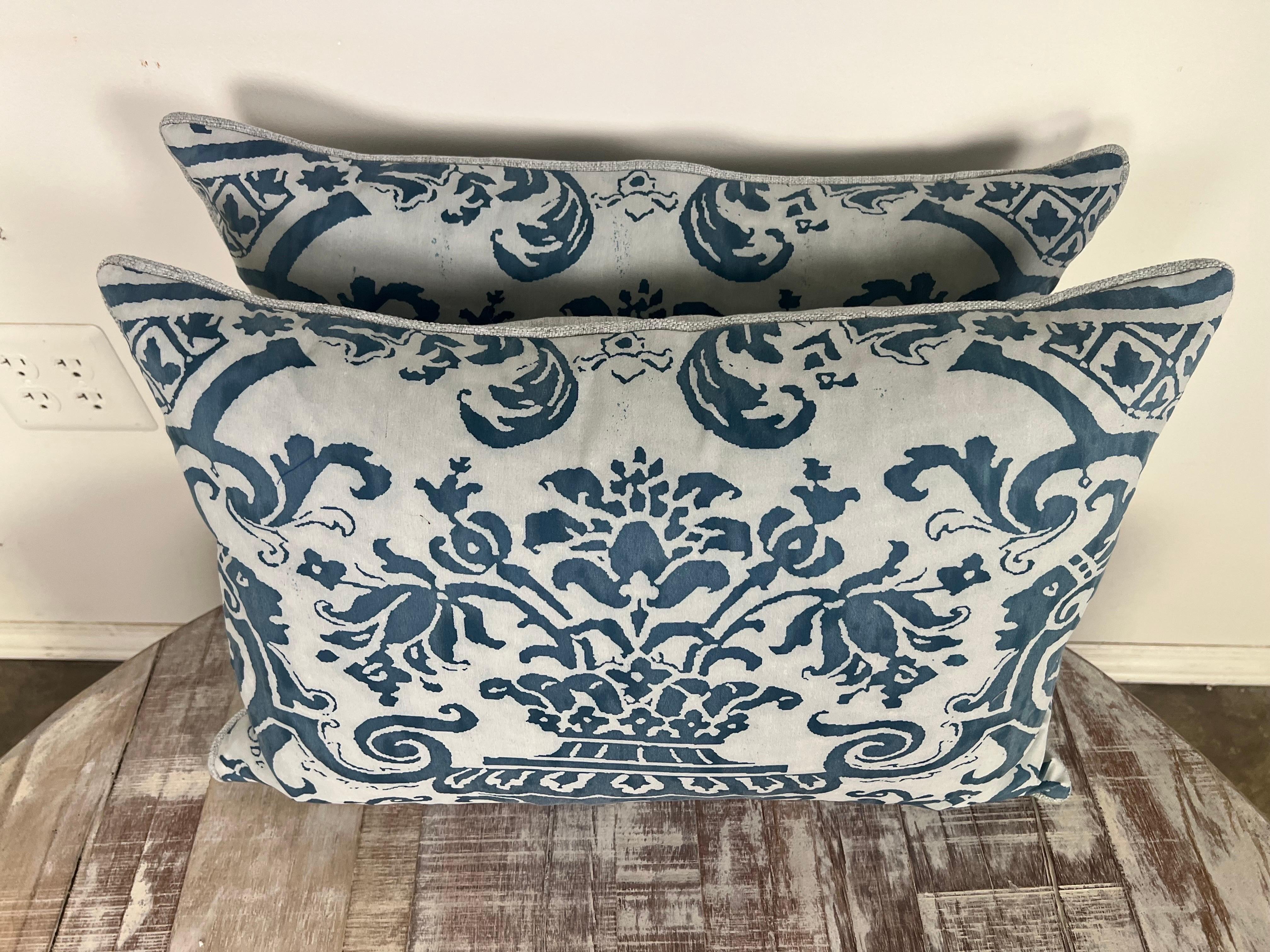 Pair of blue & white Fortuny cotton pillows with oatmeal colored Belgium linen backs. Down filled inserts, hidden zipper closures.