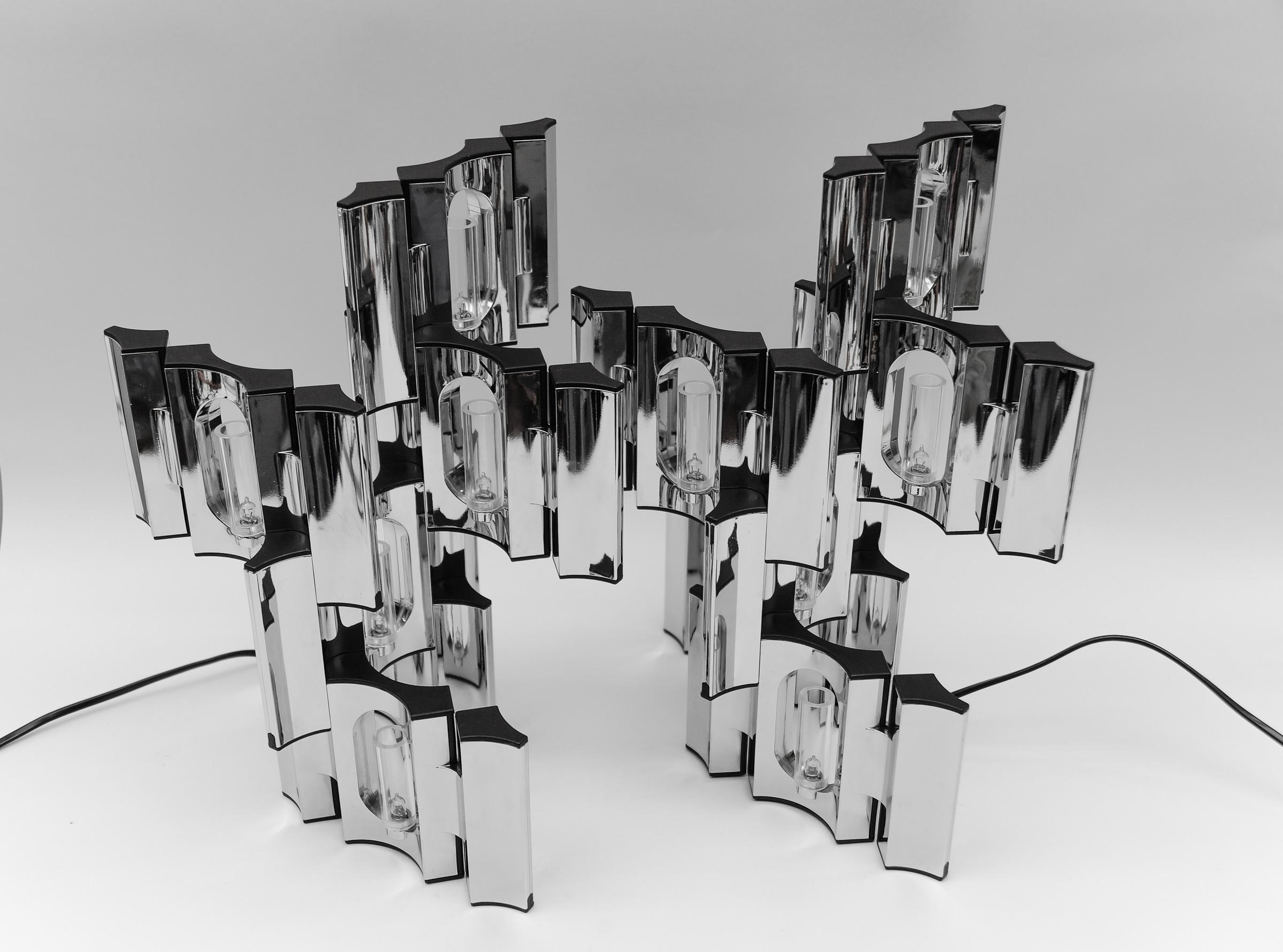 Pair of BMF Nagel Modular Table Lamps, 1960s Germany

We have a total of four identical table lamps, each consisting of a main part with cable and switch and five modular plug-in parts. So each lamp consists of a total of six parts. 

A lamp can