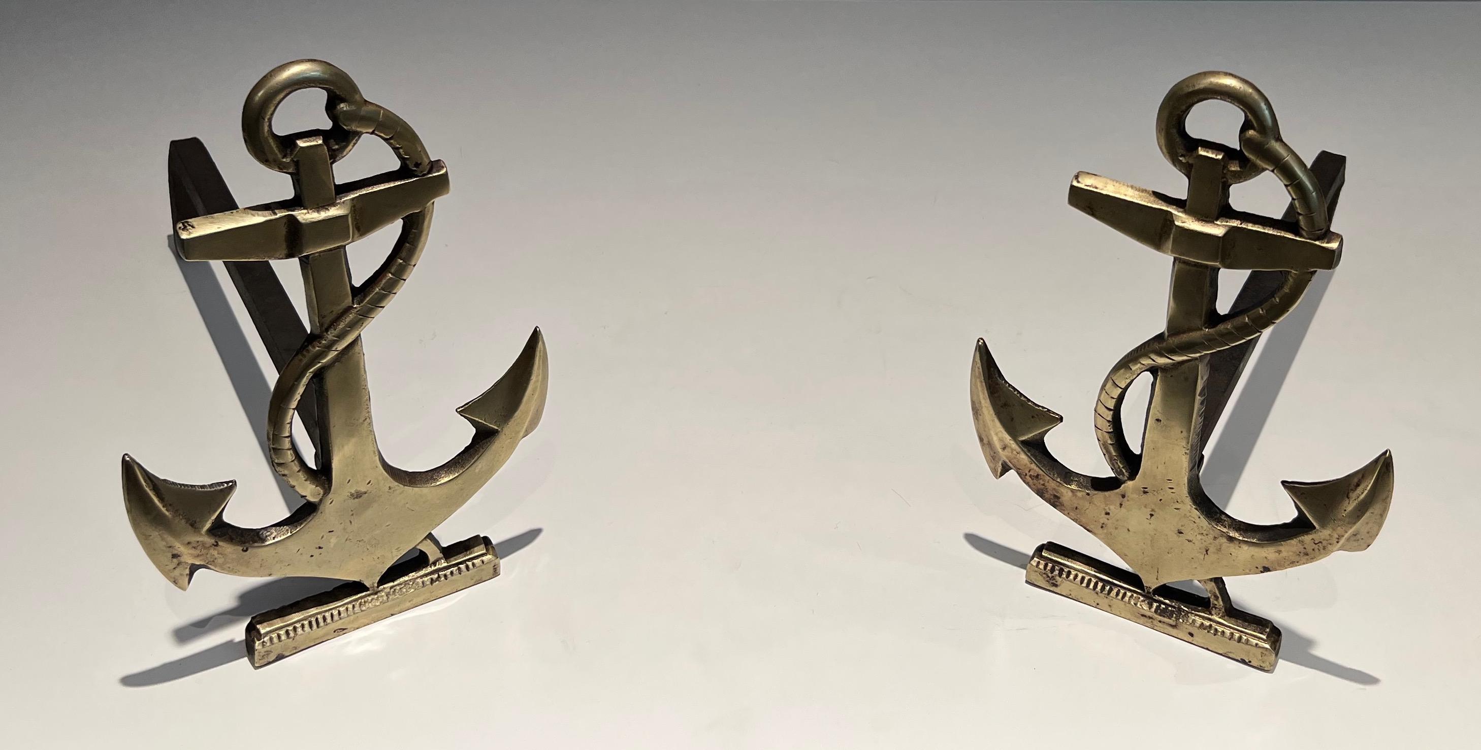 This pair of boat anchor andirons is made of brass.s This is a French work. Circa 1970.