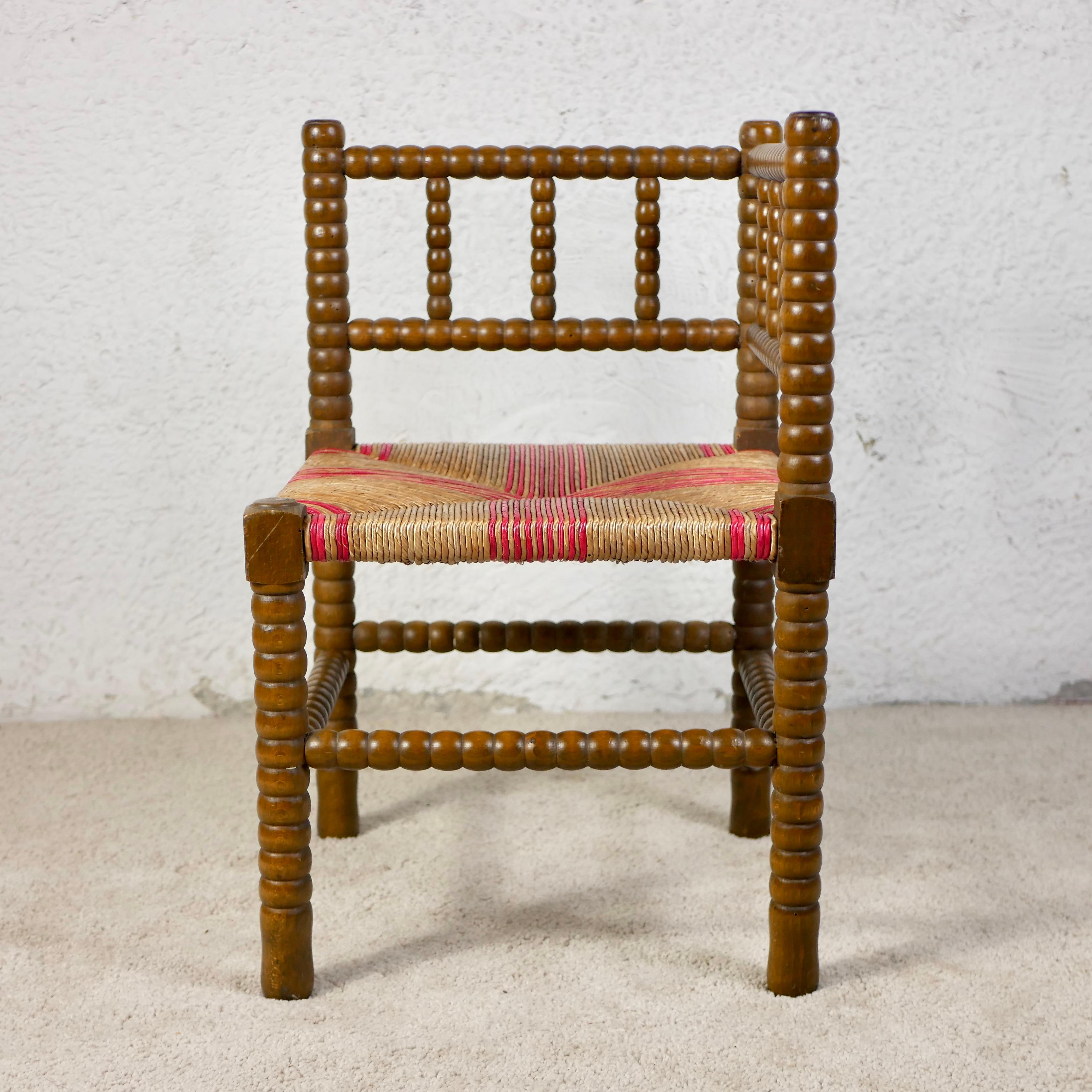 Pair of Bobbin corner chairs, wood and straw, France, early 20th century For Sale 1