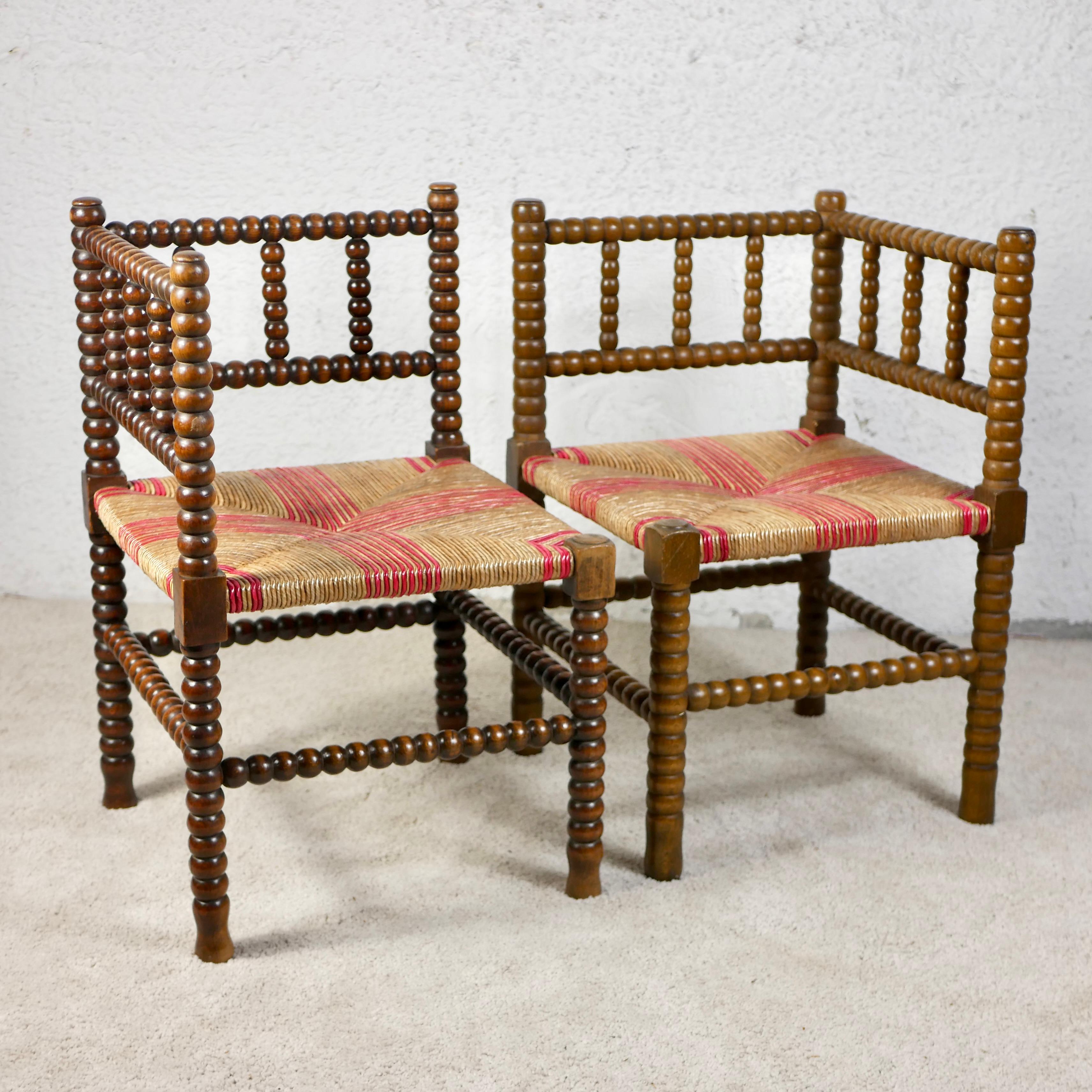 Pair of Bobbin corner chairs, wood and straw, France, early 20th century For Sale 8