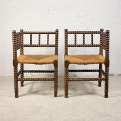 Paire de chaises d'angle Bobbin, bois et paille, France, début du 20e siècle