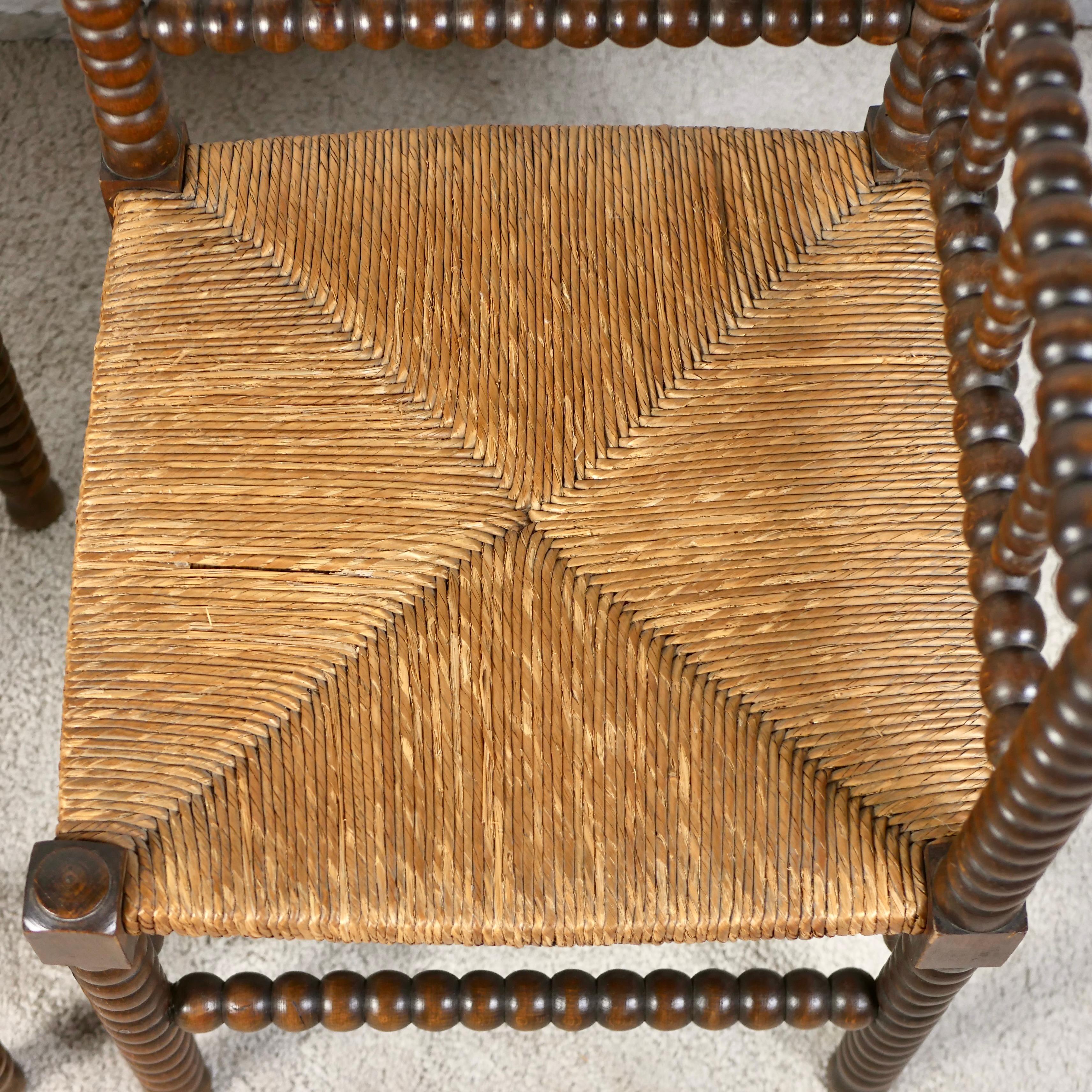 20th Century Pair of Bobbin corner chairs, wood and straw, France, early 20th century