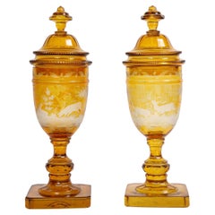 Pair of Bohemian Amber Crystal Hand-Carved And Etched Covered Pokals, 1880