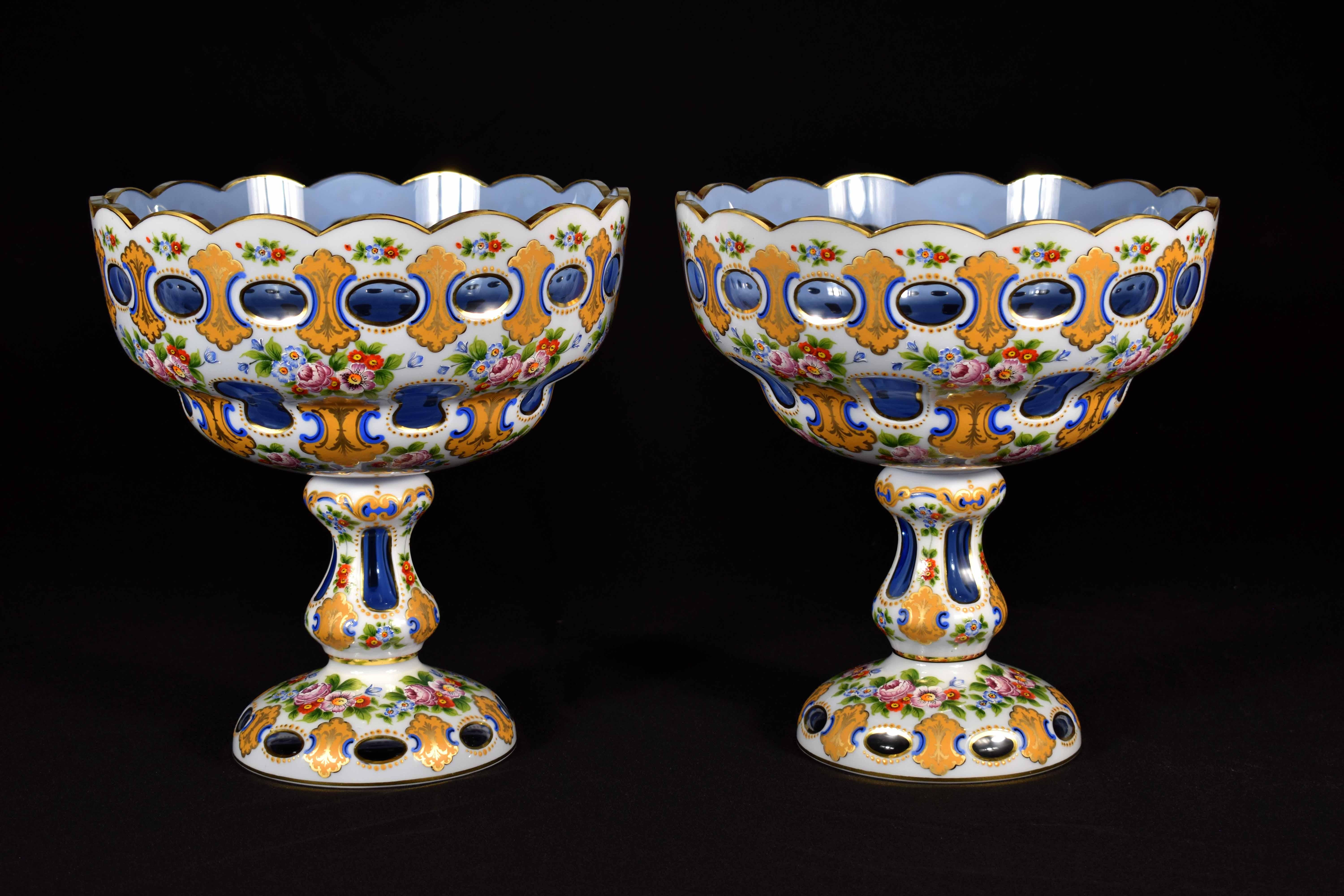 A pair of large glass fruit bowls. It is a light cobalt glass inherited from opal glass, handcut and hand painted, the painting is done with the original technique and several burns of colors, everything is made to order in the style of the 19th