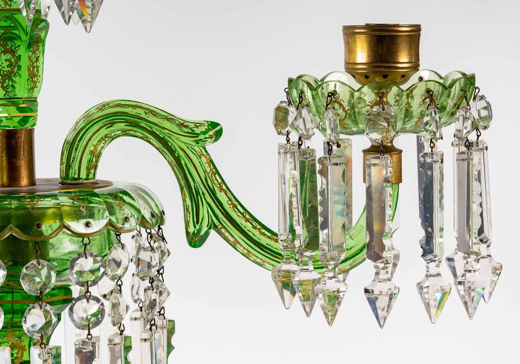 Spectacular pair of Bohemian crystal candelabras, 19th century, emerald color, 4 arms of lights, rich gold decoration.
 