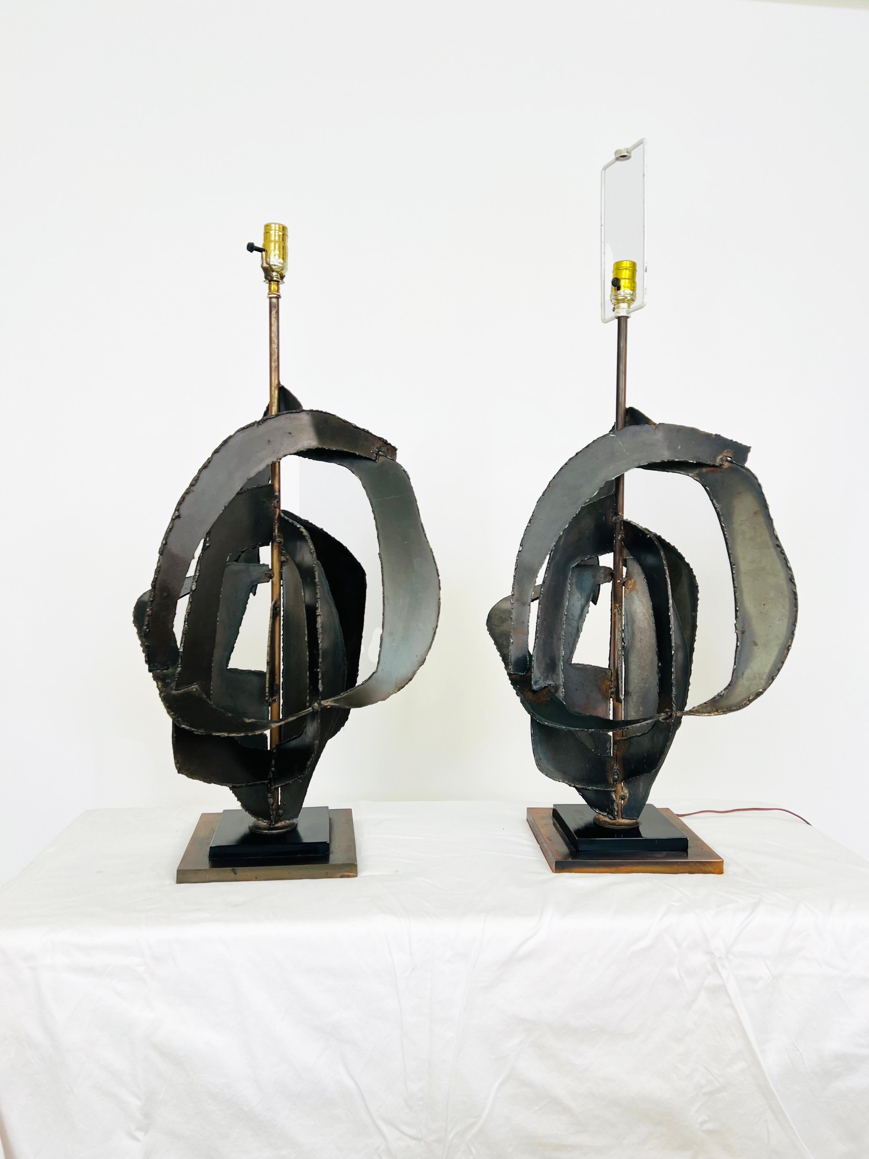 As found, this pair of handsome brutalist lamps designed by Richard Barr for the Laurel Lamp Company are guaranteed to make a bold, handsome, dramatic statement in any room.  