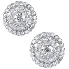 Paire de boucles d'oreilles bombées serties de diamants