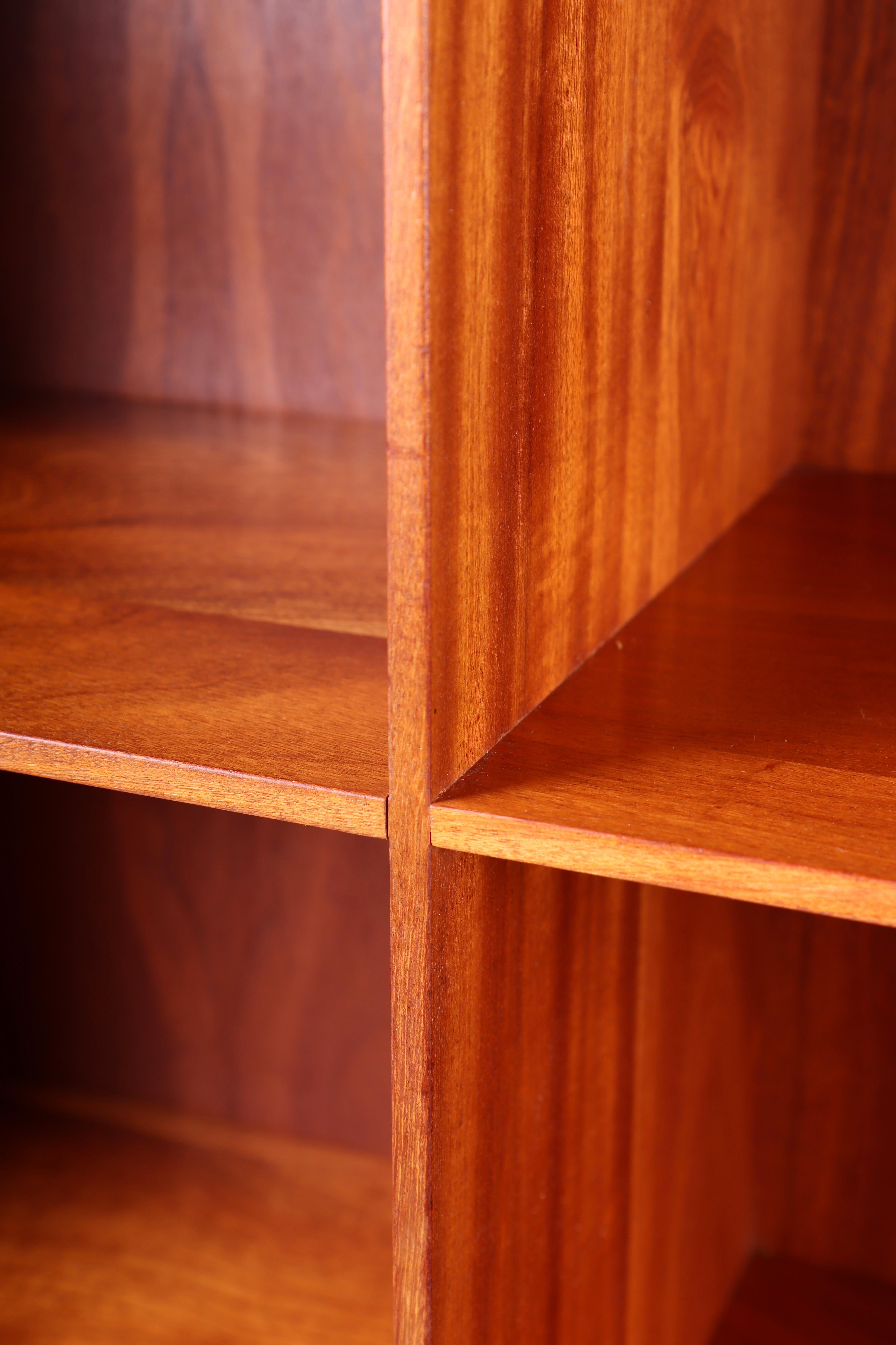 Pair of bookcases in solid mahogany designed by Mogens Koch for Rud. Rasmussen cabinetmakers in 1933. Made in Denmark and in all original condition.
Each bookcase is D 28cm, W 76, H 82 with base, 76 without base.