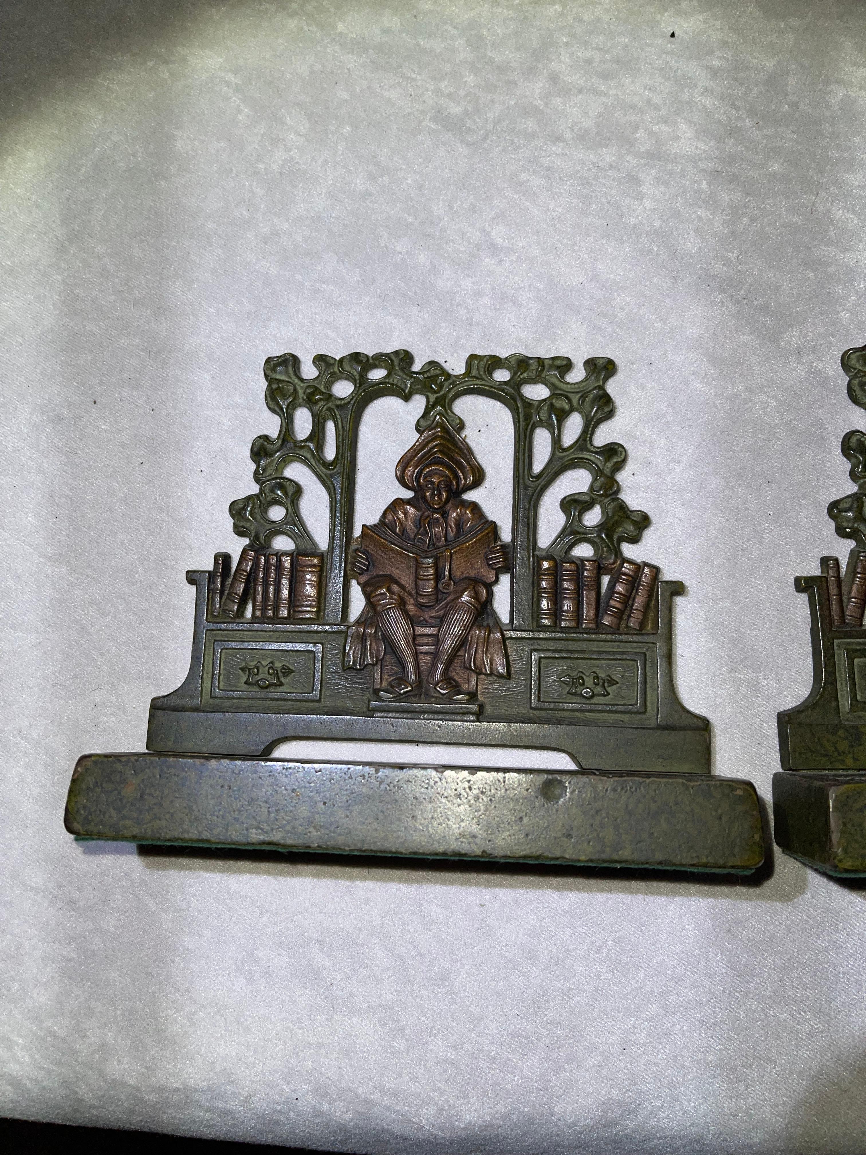 These bookends were done by the great makers Judd Co. Amazingly the factory label underneath is still intact and reads 