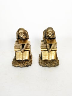 Pair of bookends depicting sculptures of monkeys in gilded metal, France, 1970
