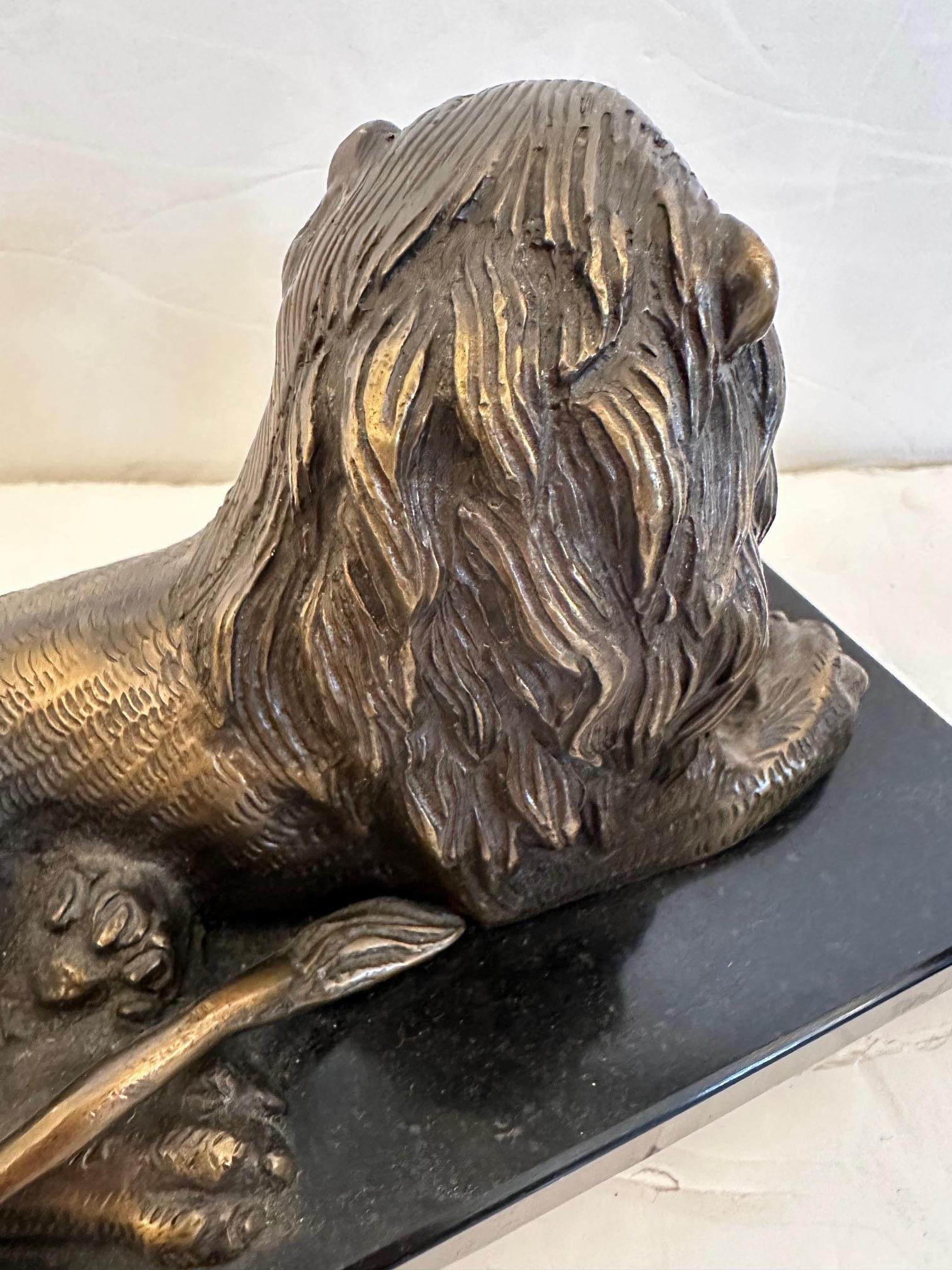 Pair of Bookends Having Recumbent Bronze Lions on Belgian Slate Bases For Sale 4