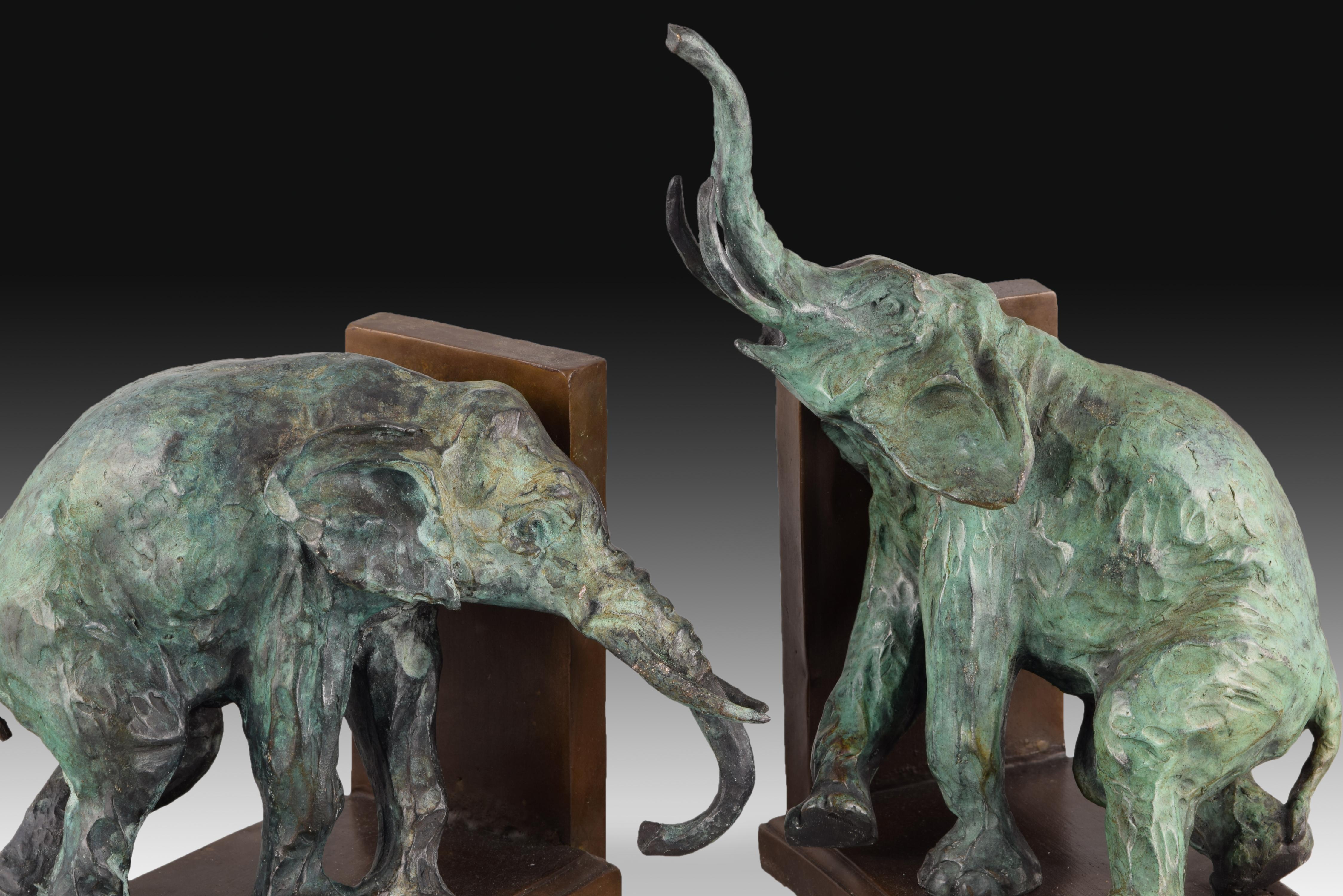 Pair of Bookends in Patinated Bronze, 