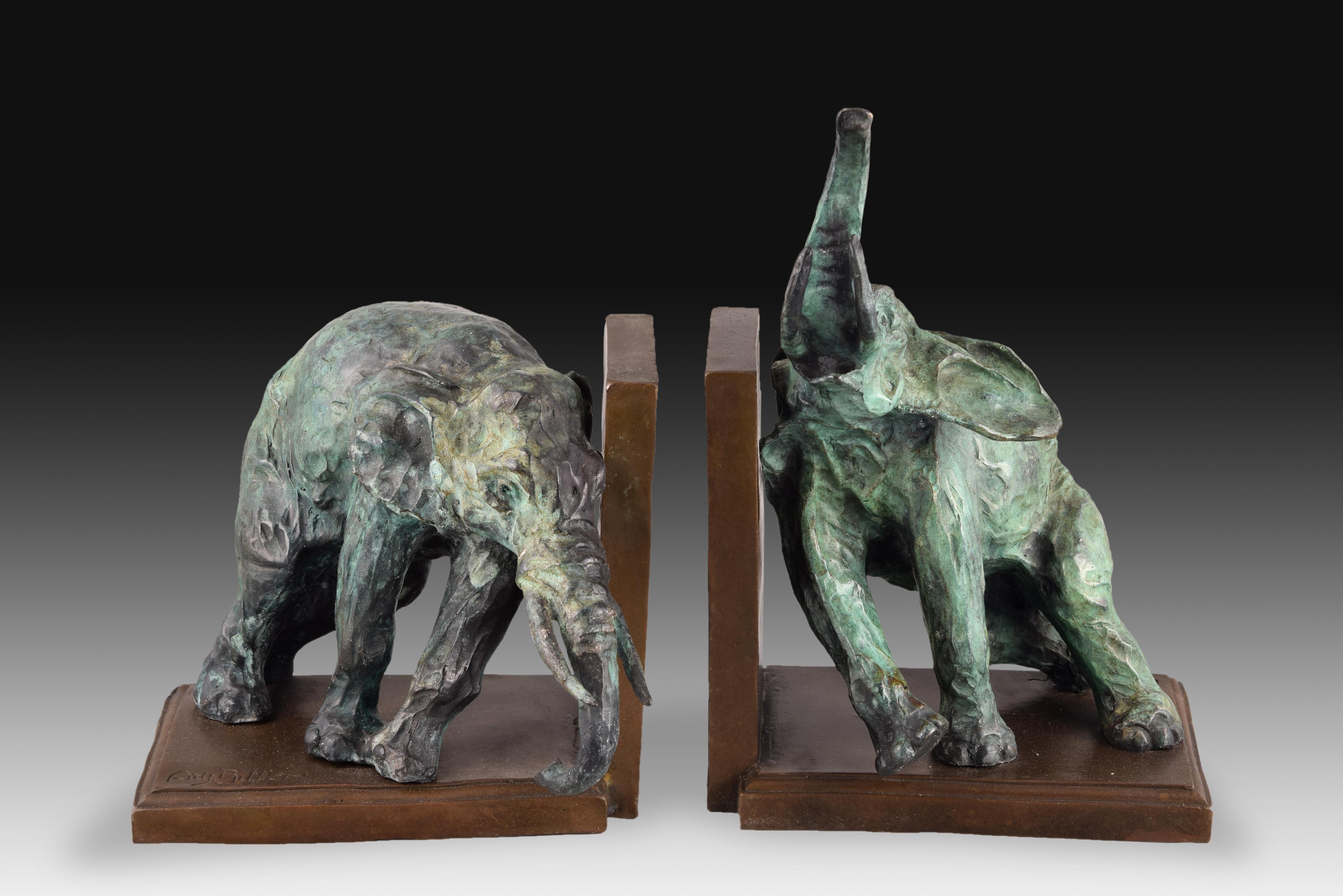 Pair of bookends in patinated bronze. 