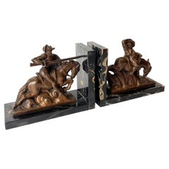 Pair of Bookends with Scenes from Don Quixote, Signed A. Soleau.