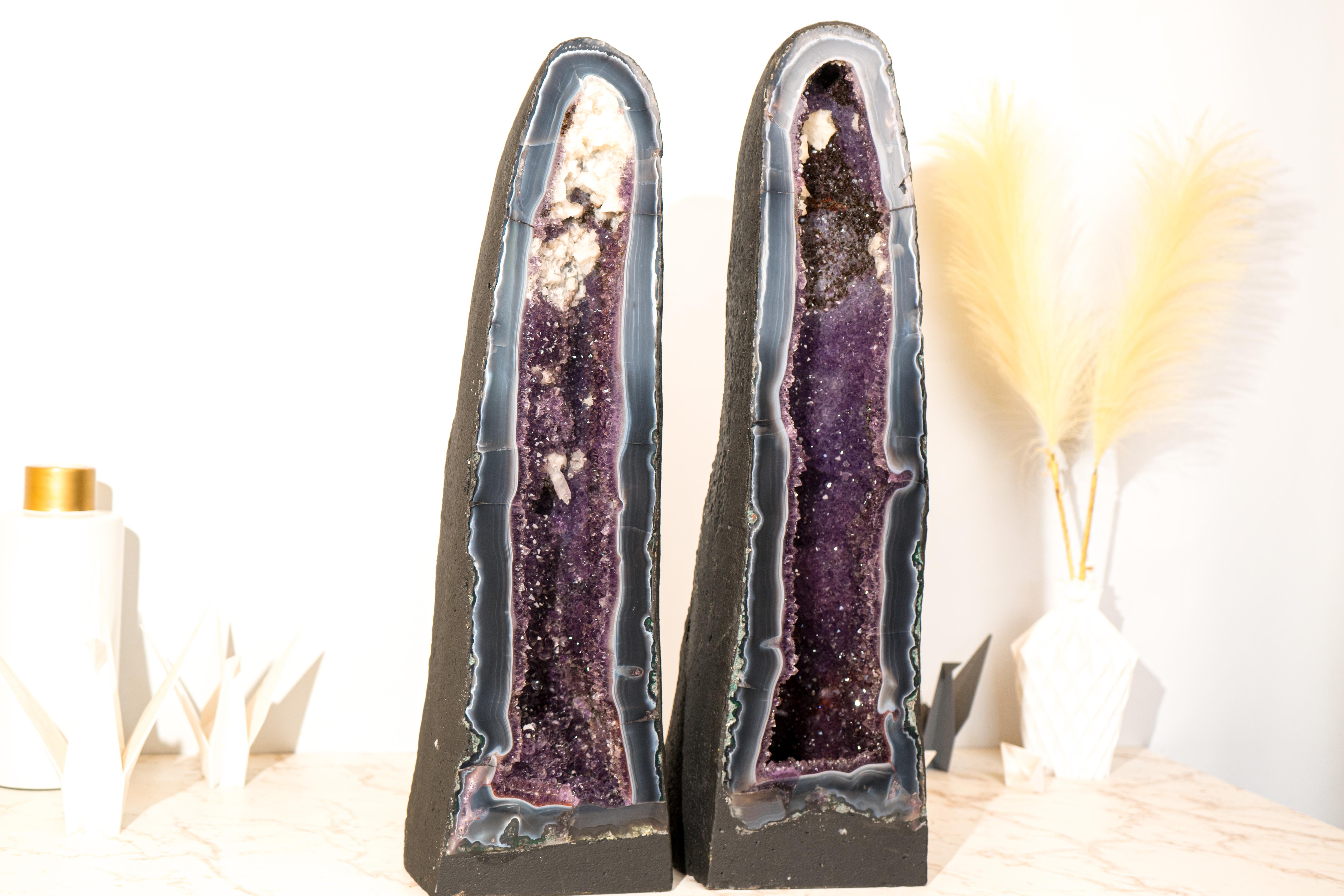 Gorgeous Tall Blue Banded Agate Geode with Sparkly Amethyst and Calcite Inclusions 

▫️ Description

Breathtaking and beautiful, this Lace Agate with Amethyst Geode features spectacular blue-banded agate lines on a rare, slim, stunning aesthetic