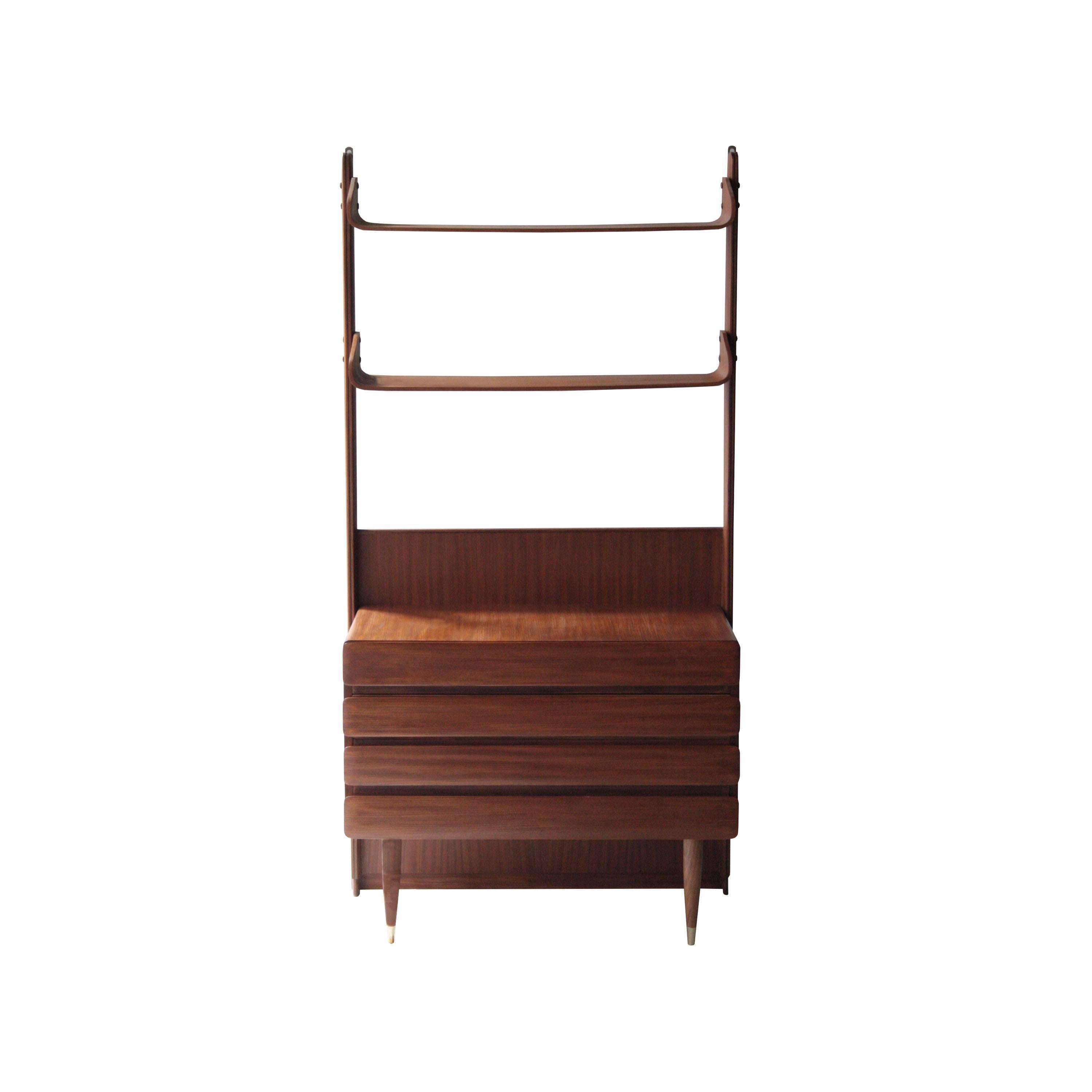 Pair of shelves in solid rosewood with shelves. Lower modules with drawers. Front feet with conical shape topped in brass detail.