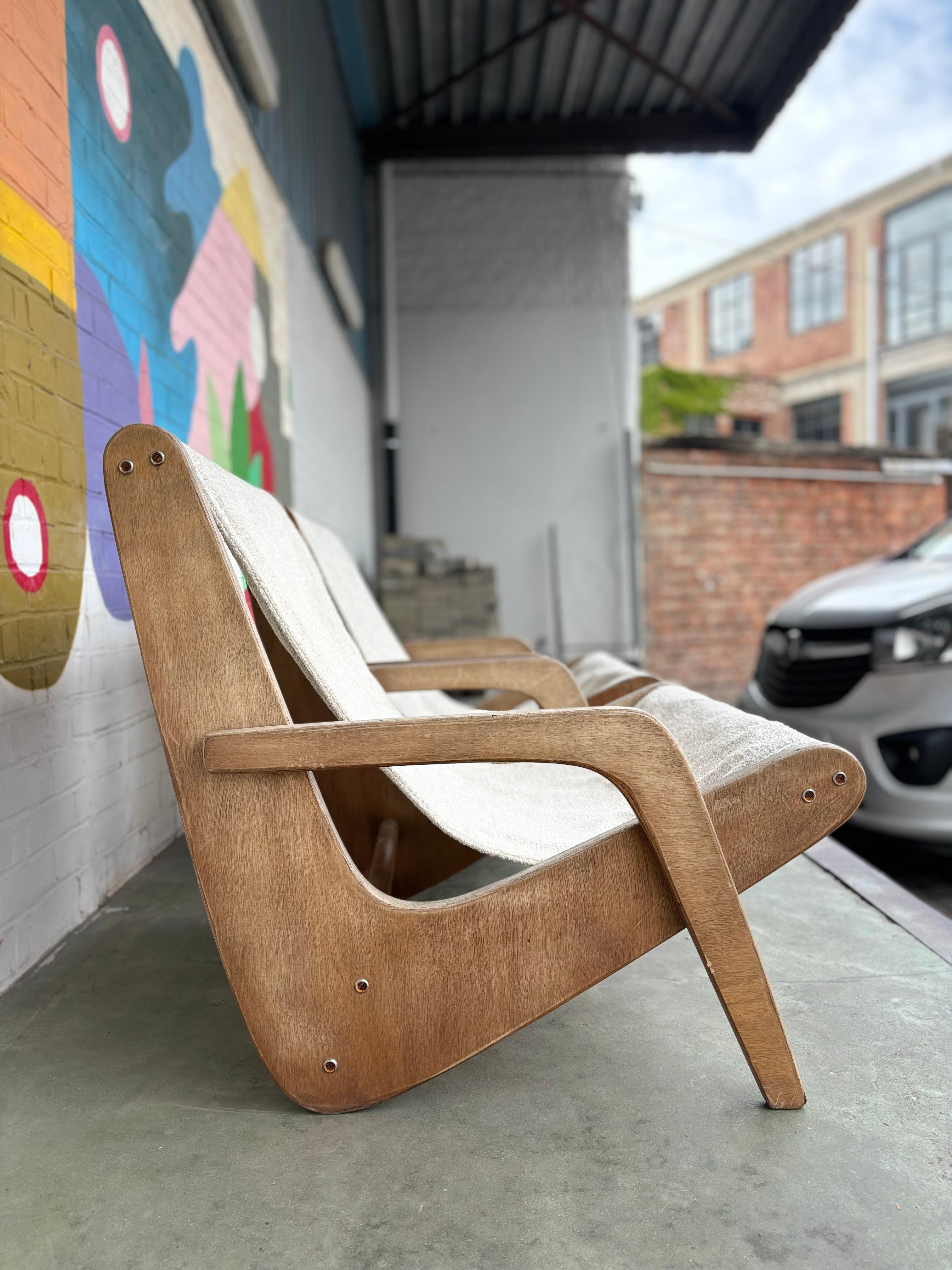 Brazilian Pair of boomerang slipper chairs by Zanine Caldas For Sale