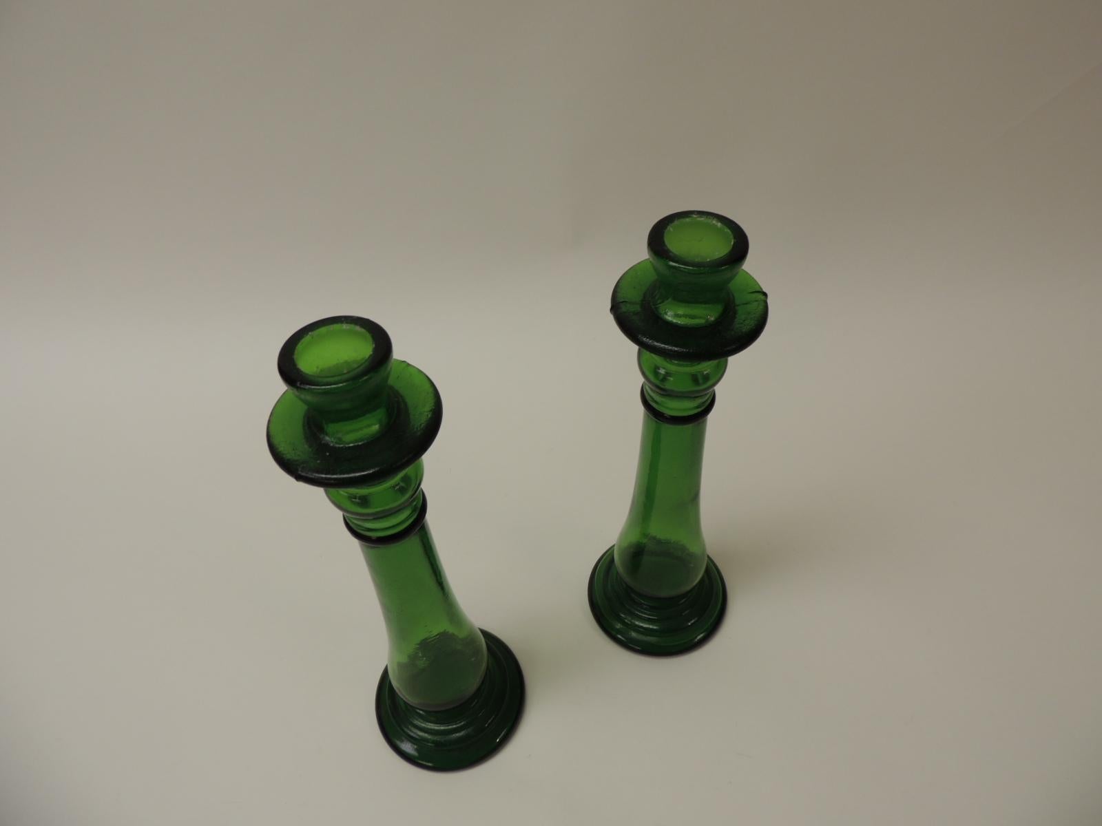 Pair of bottle emerald green handcrafted Italian candle holders.
Green candle sticks with round vase. Paper label stamped 