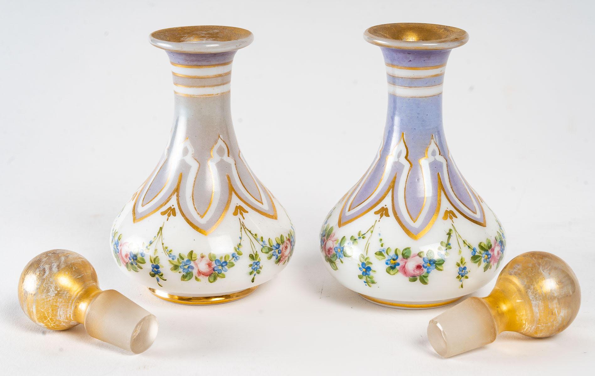 Pair of bottles in Ppainted and Gilded Opaline, Napoleon III period.

Nice pair of 19th century bottles, Napoleon III period, in painted and gilded opaline, crystal stopper.

Dimensions: H: 14cm, D: 8cm.