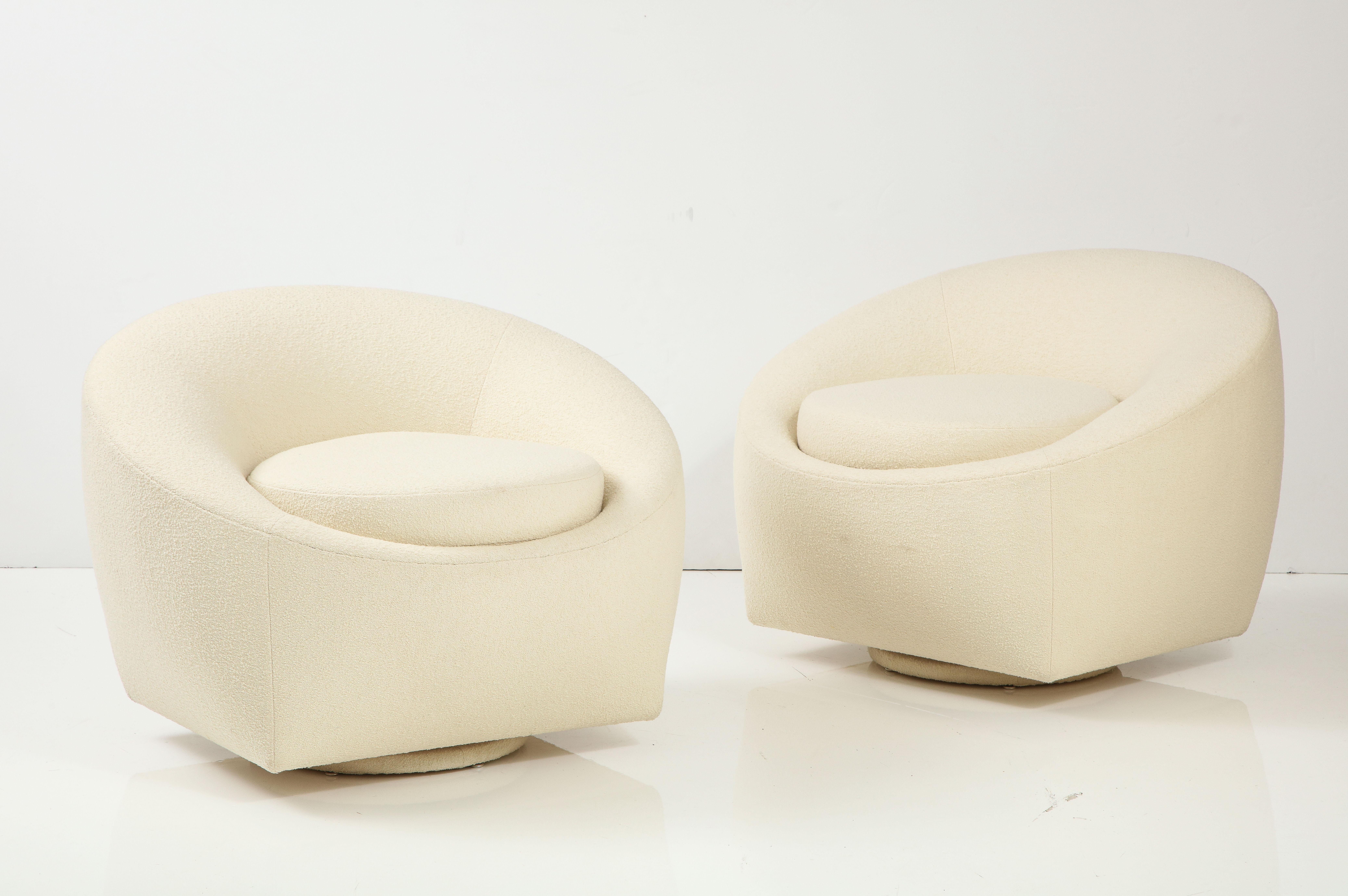American Pair of Boucle Upholstered Swivel Chairs. For Sale