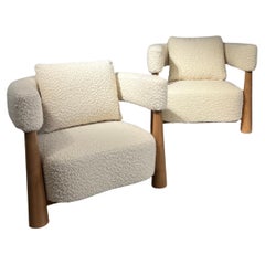 Pair of bouclette & light wood easy chairs