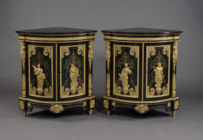 A fine pair of Louis XIV style gilt bronze mounted and boulle marquetry inlaid corner cabinets depicting the Four Seasons, in the manner of Andre-charles boulle, by Béfort Jeune.

French, circa 1870. 

Stamped to the reverse of the bronze mounts