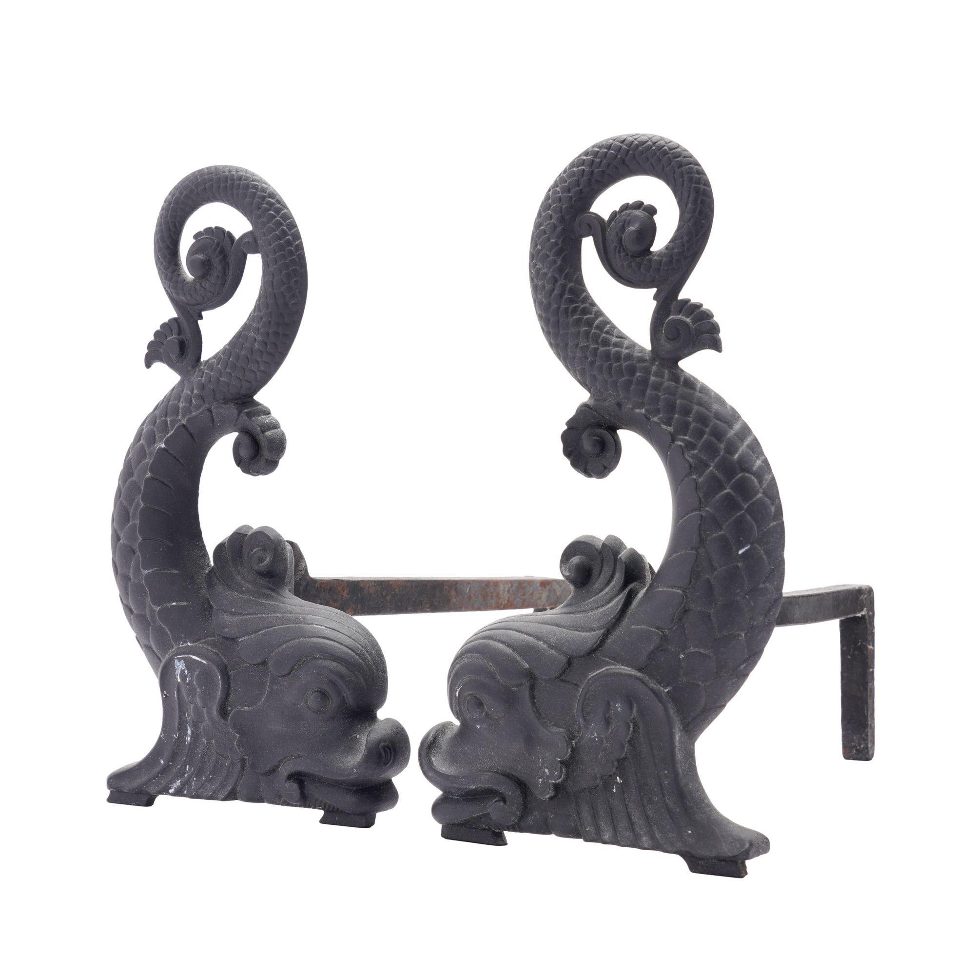 Pair of cast iron dolphin form andirons on iron log rests. The andirons are facing and the log rests are removable and attached by means of a dovetail joint.
Marked in the castings on the reverse: B&H, PAT'APLD FOR, 9512
Meriden, Connecticut, circa