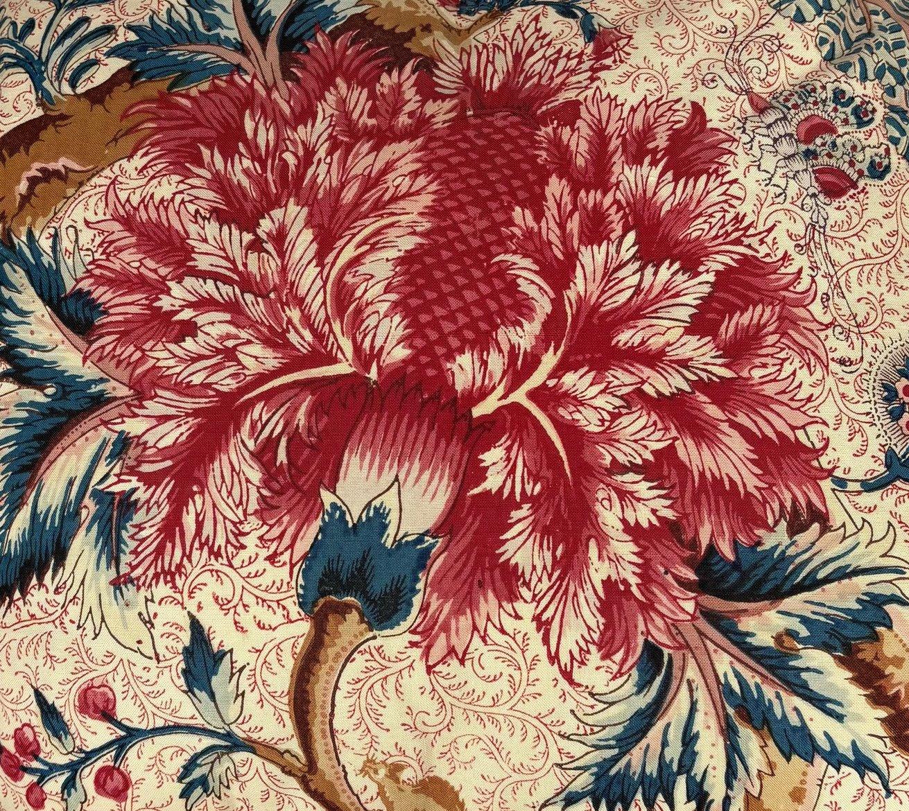 Beautiful handcrafted and timelessly elegant pair of  decorative down-filled throw pillows, in celebrated Braquenié ‘Grand Corail’ printed cotton , inspired by 18th century French Indienne, with  red linen-cotton piping and back.