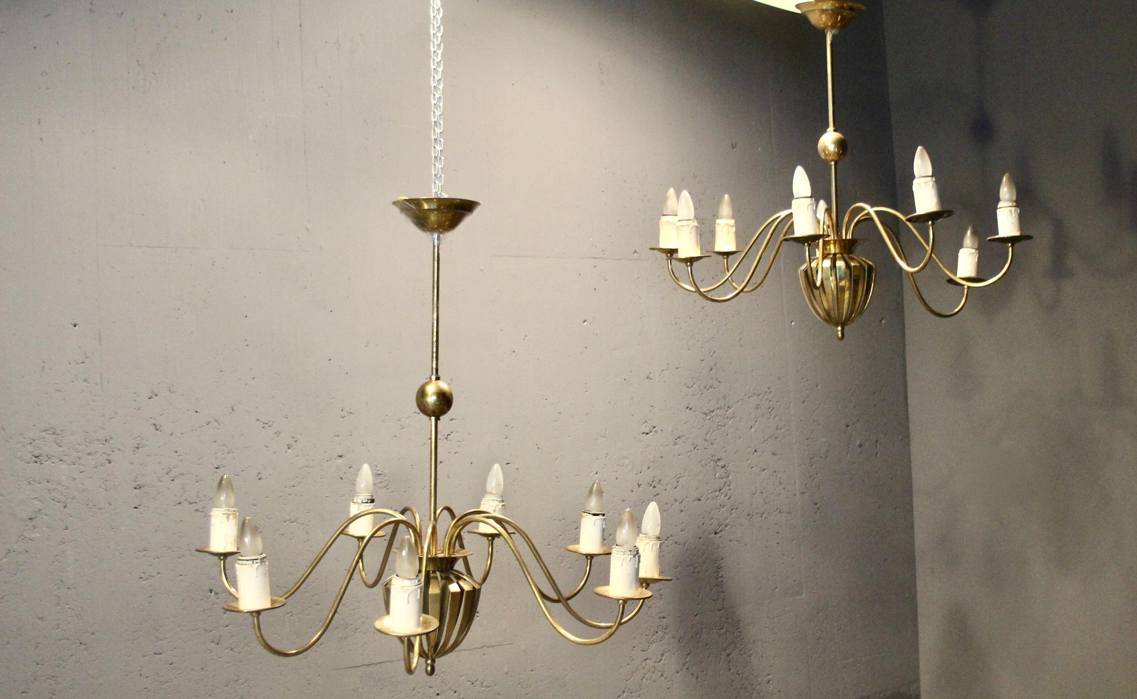 Par de sujetadores de araña mediados del siglo XX en venta