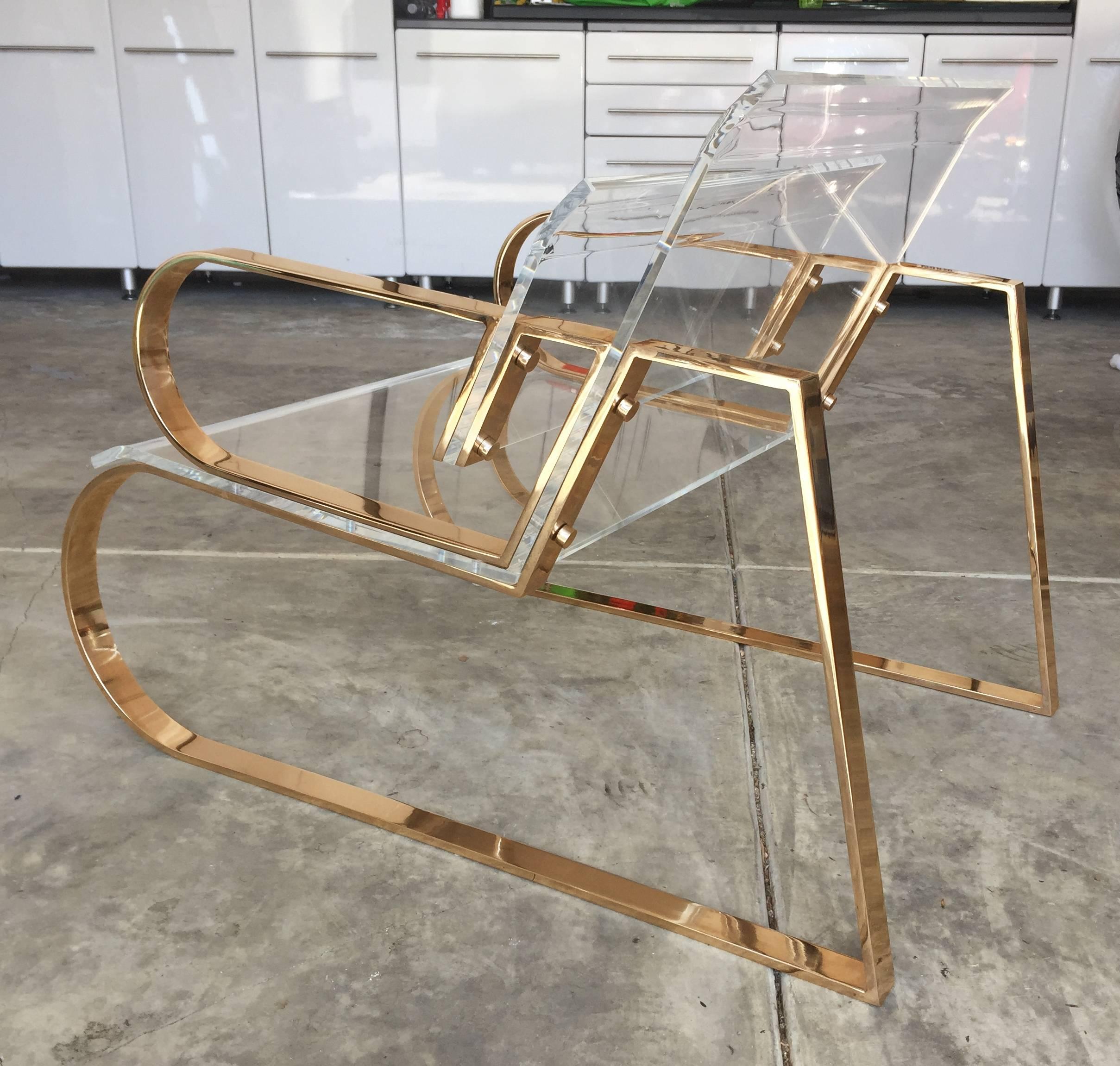 Pair of stunning lounge chairs in Lucite and stainless steel by famed designer, Charles Hollis Jones.
The chairs are from the Double Waterfall collection manufactured in 2016.
The Double Waterfall chair is part the Waterfall Line.
The inspiration