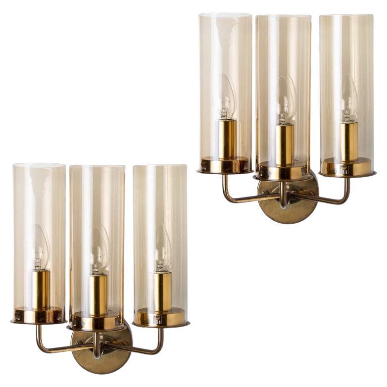 Pair of Brass and Amber Glass Wall Lights by Jakobsson, 1960