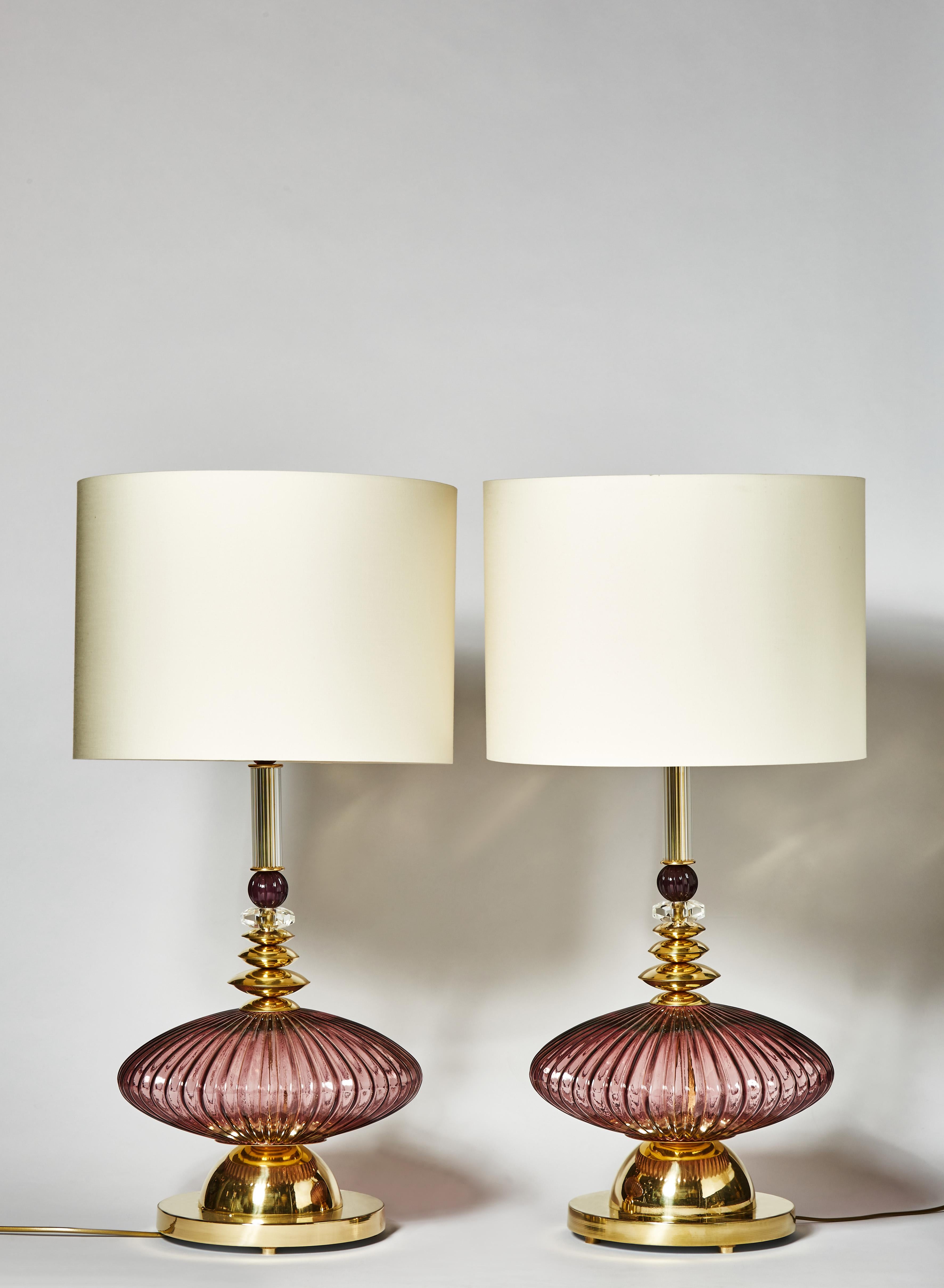 Pair of lovely table lamps made of different brass and amethyst tinted Murano glass pieces.
