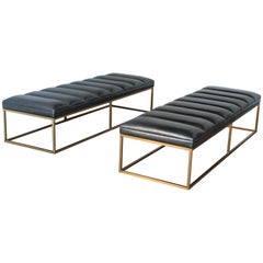A Brass and Black Channel Tufted Black Leather Bench