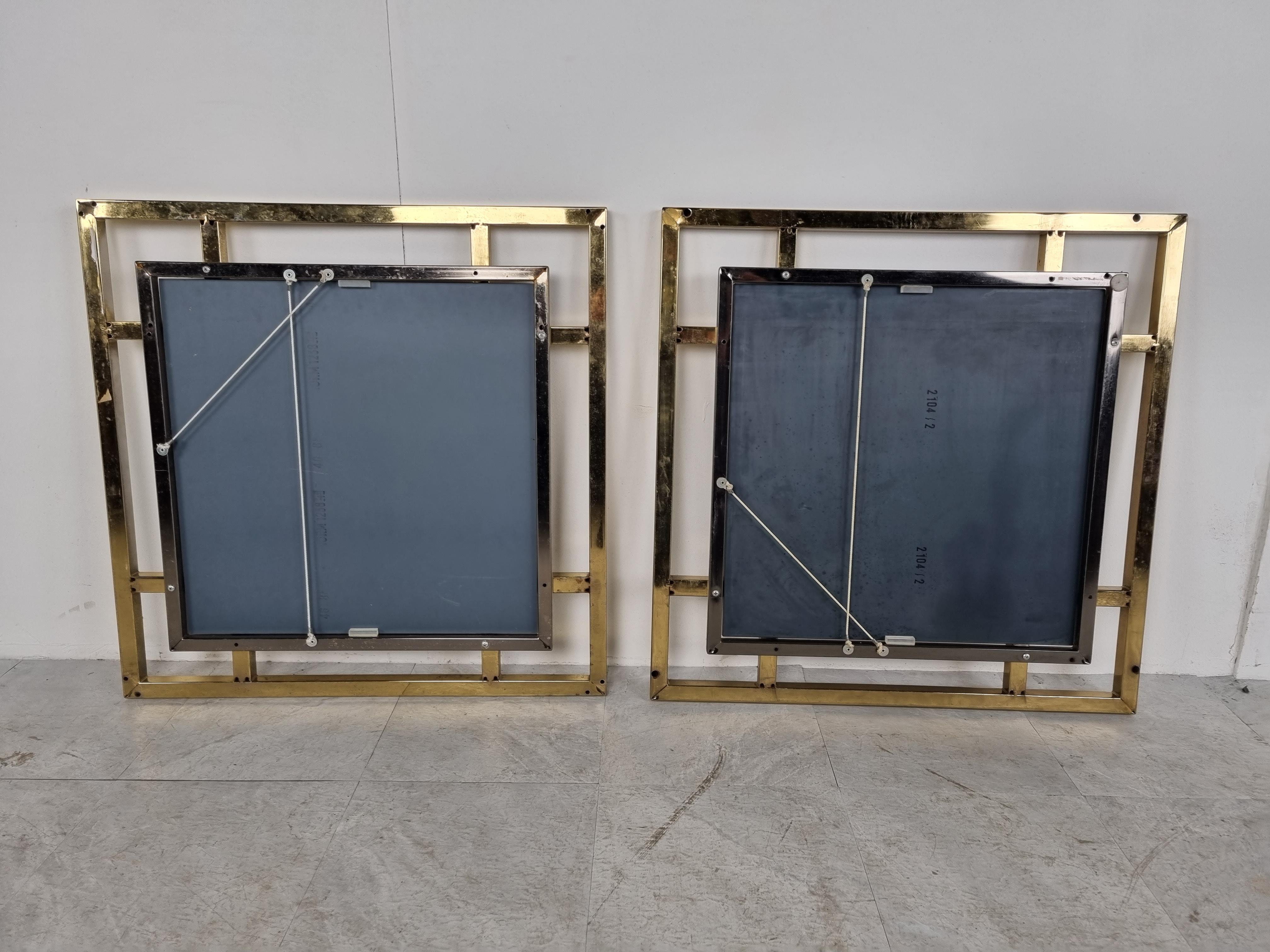 Pair of beautiful geometrical brass and chrome mirrors by Belgochrom with smoked mirror glass.

They look great as a pair.

1970s - Belgium

Good condition

Width x height: 70cm/27.55