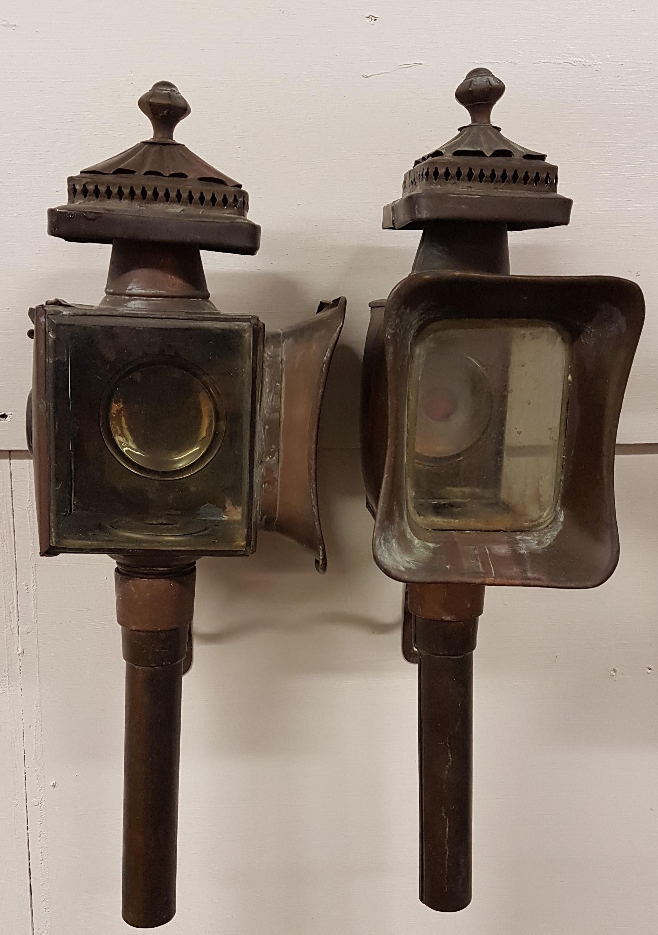 A very nice pair of early 1980s reproduction carriage lanterns from the Limehouse Lamp Company. This is a company that specializes in the highest quality exact copies of original examples. They are in very good condition with a nice amount of