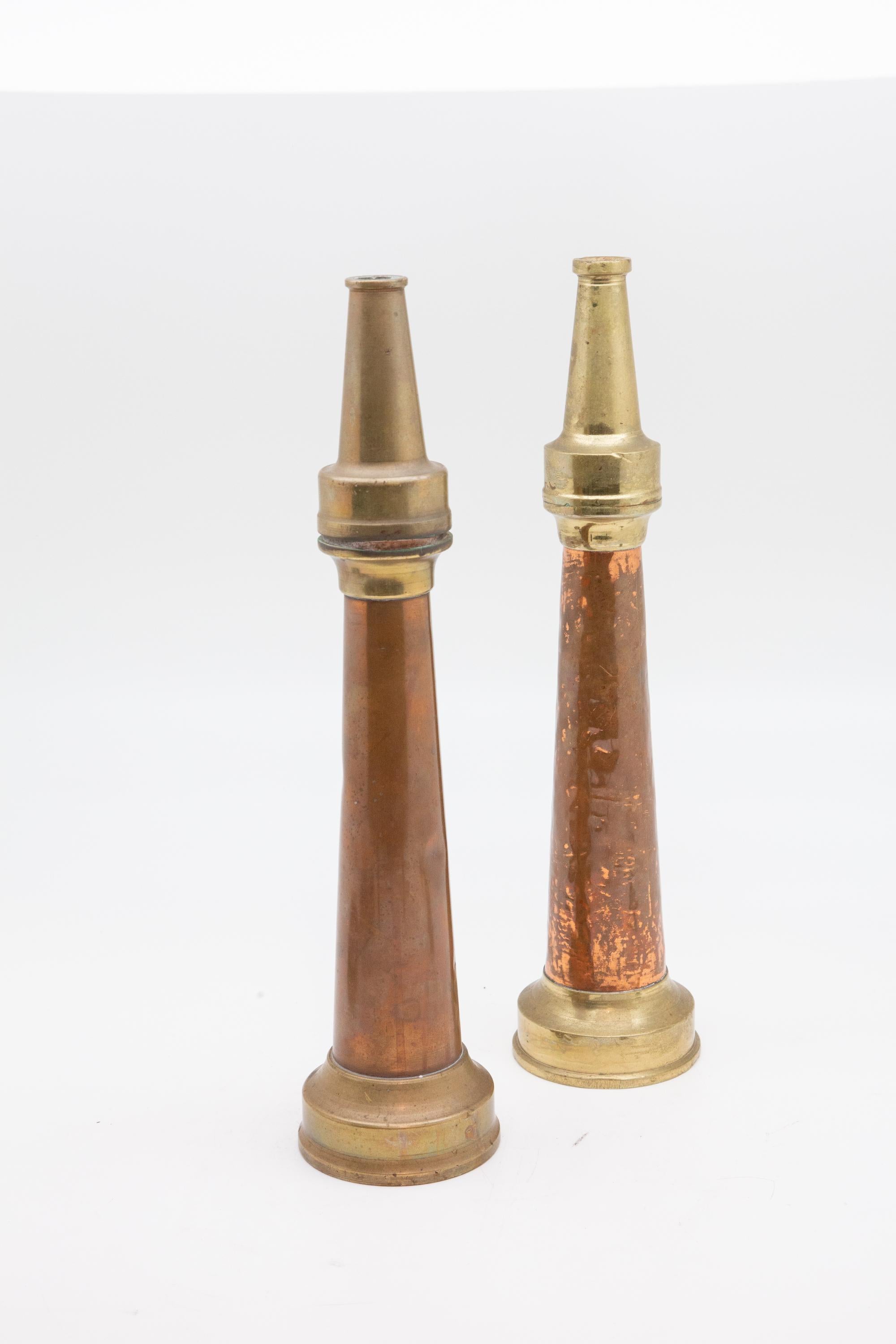Pair of brass and copper vintage fire hose nozzles. Measures: 16