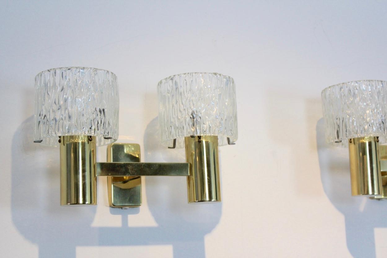 Scandinavian Modern Pair of Brass and Crystal Wall Lamps designed by Carl Fagerlund for Orrefors For Sale