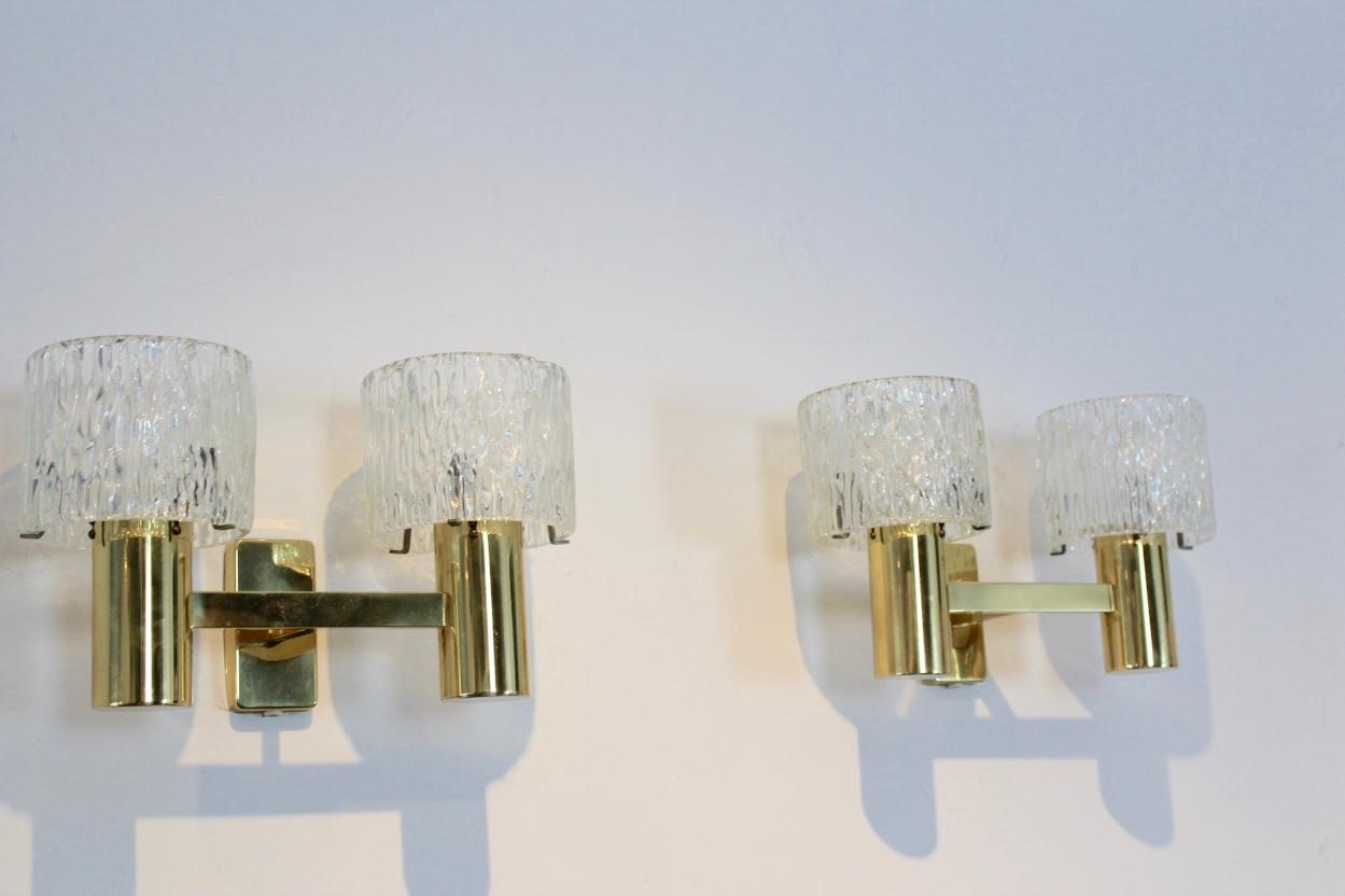 20th Century Pair of Brass and Crystal Wall Lamps designed by Carl Fagerlund for Orrefors For Sale