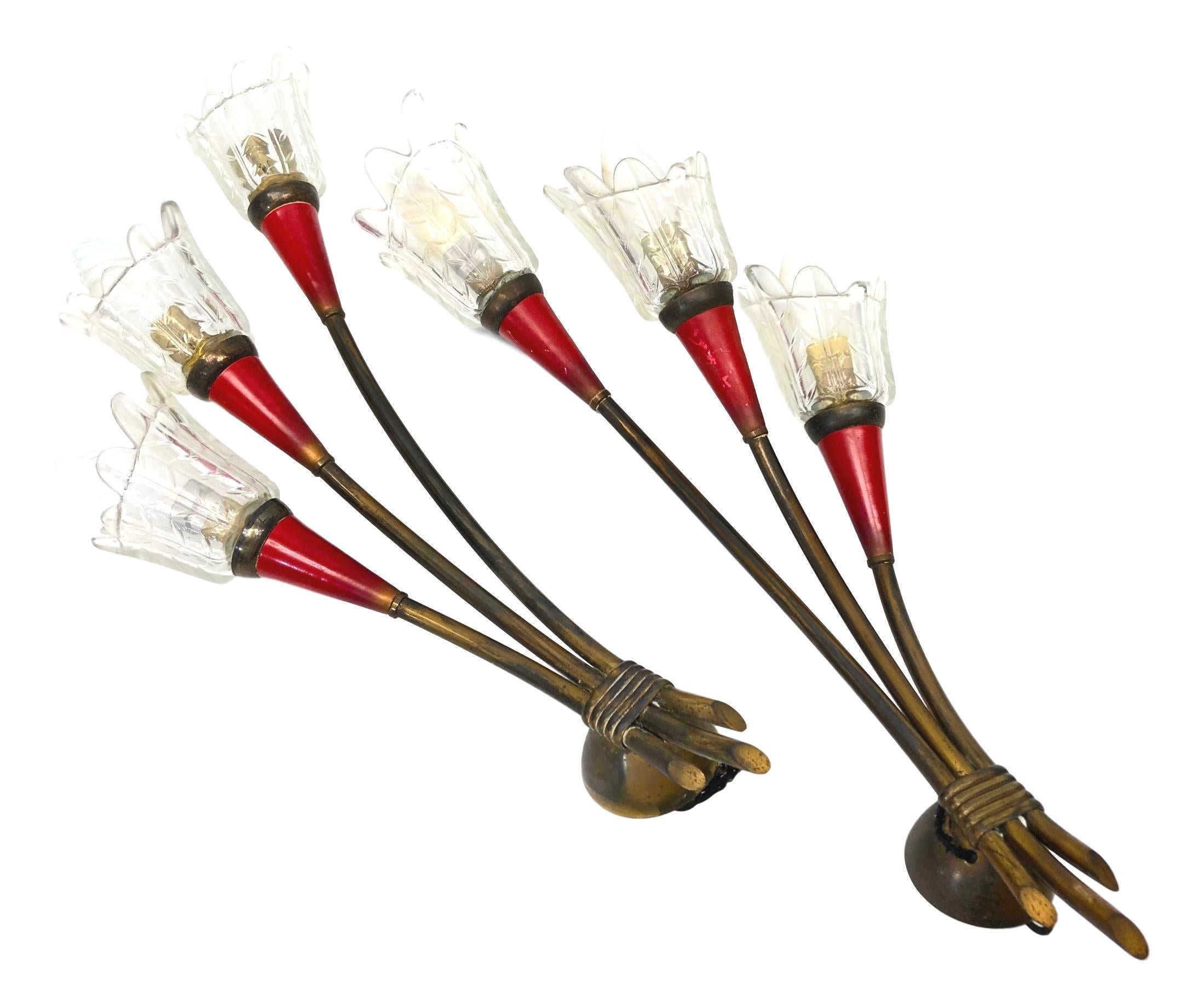 Delightful 1950s French modern wall lights by Maison Lunel in the shape of a flower bouquet. Brass hardware with ruby colored Lucite and clear glass shades. Very good original vintage condition with some loss of paint on the lacquered parts. Each