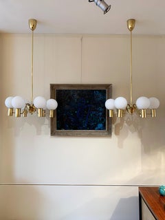 Pair of Brass and Glass Globes Chandeliers by Hans-Agne Jakobsson