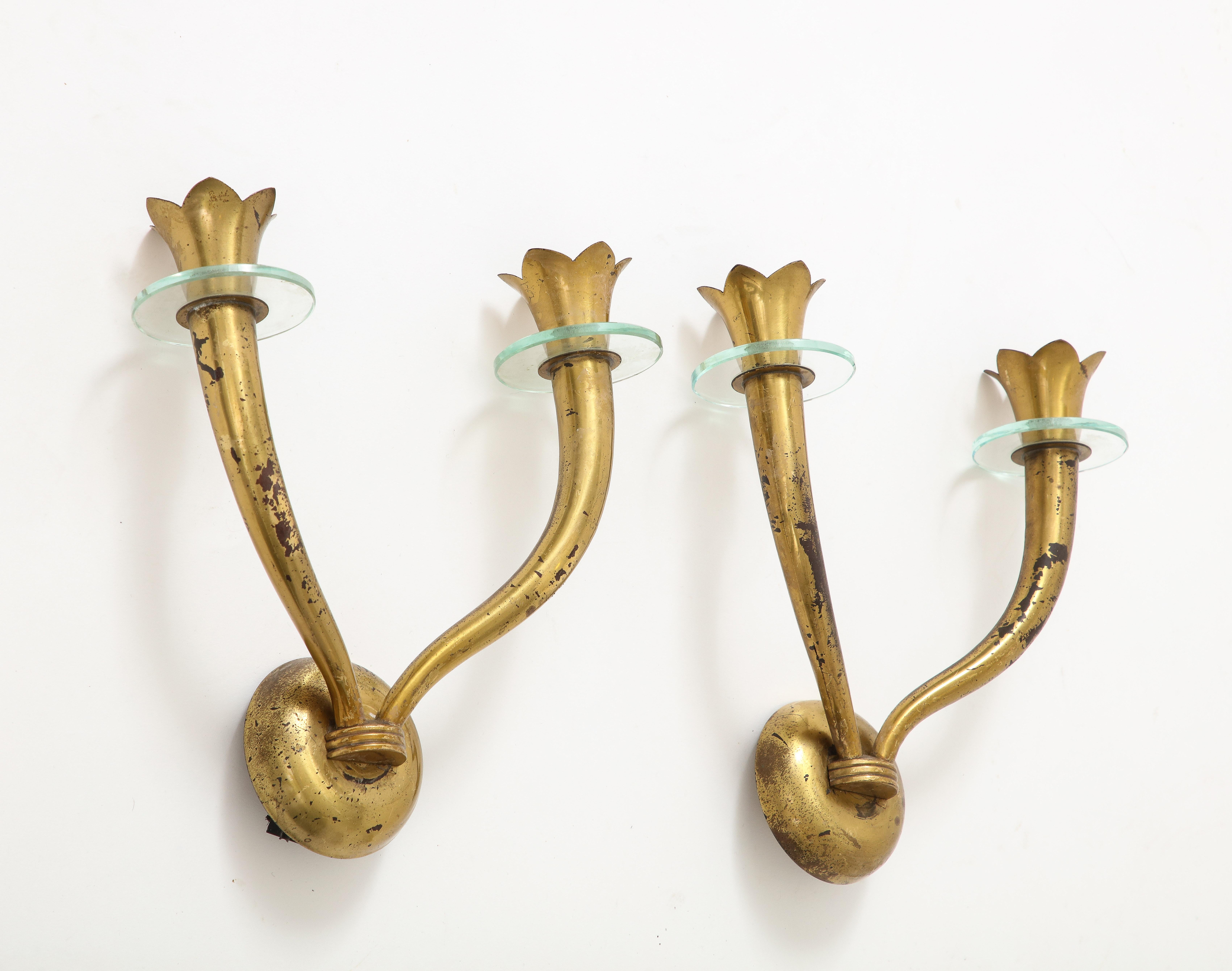 Pair of midcentury brass and glass Italian sconces attributed to Emlion Lancia - Italy 1950s
European socket and wiring
Patina and fading on all surfaces, please check pictures.
Third sconce available.