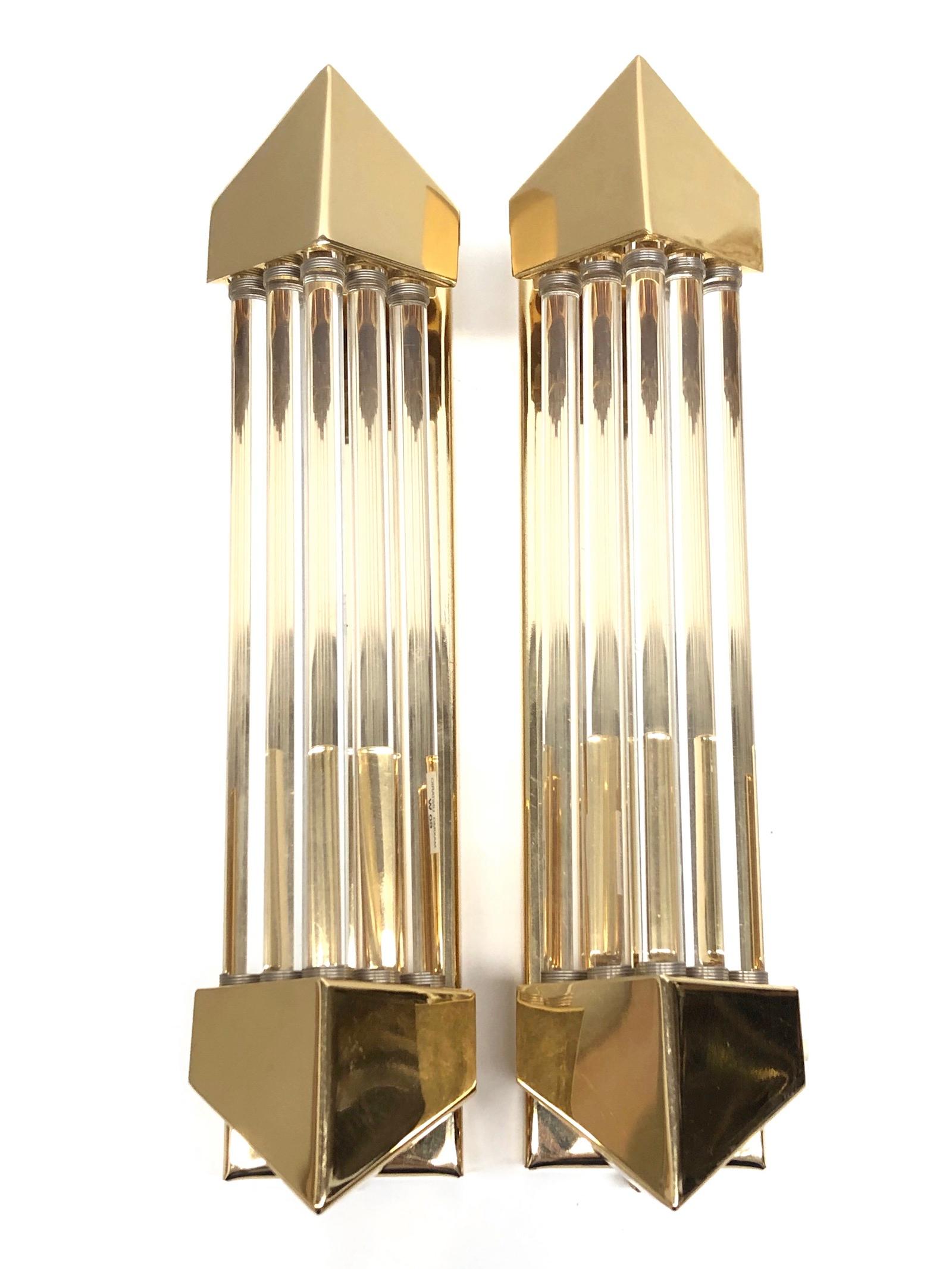 A stunning pair of Rod wall sconces made by Honsel Leuchten Germany. Each with angled brass ends and a single brass wall plate with a solo socket and mount make for a beautiful wall light. Easy to mount and fantastic to look at. The fixture requires