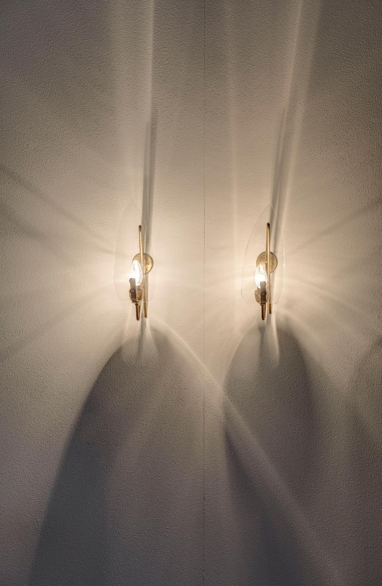 Mid-Century Modern Pair of Brass and Glass Sconces