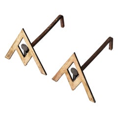 Pair of Brass and Iron Modernist Andirons in the Style of Adnet, France, 1950's
